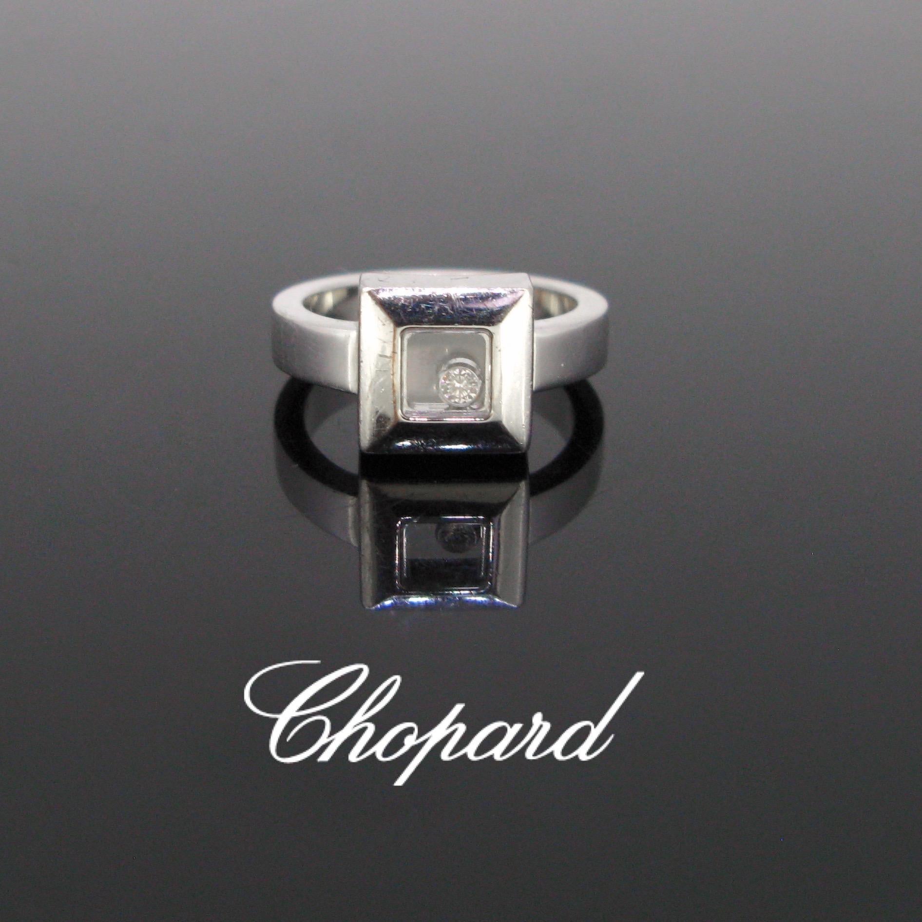 Weight:	11.72gr

Metal:		18kt white Gold

Stones:	1 diamond
•	Cut:	Brilliant
•	Carat:	0.05ct
•	Color:	F
•	Clarity:	VVS
	
Condition:	Very Good

Signature:	Chopard, nº 2982172 82/2938

Hallmarks:	Swiss

Comments:	This ring from Chopard is from the
