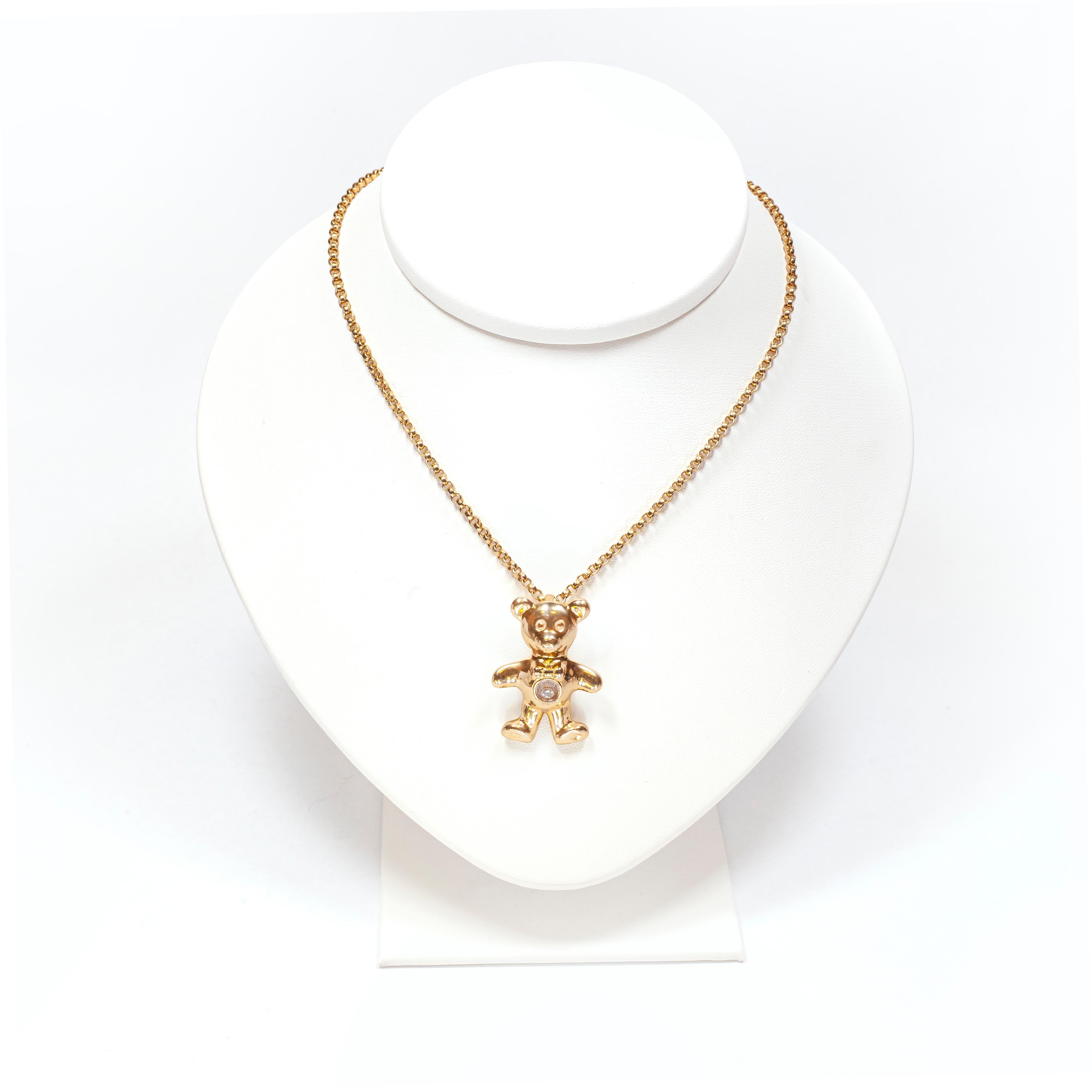 This stunning Chopard teddy bear 'Happy' necklace is a beautiful slice of nostalgia. 

As is the joy with the Chopard Happy Diamond collection, the rub-over set round brilliant cut diamond weighing approximately 0.05 carat is free moving within a