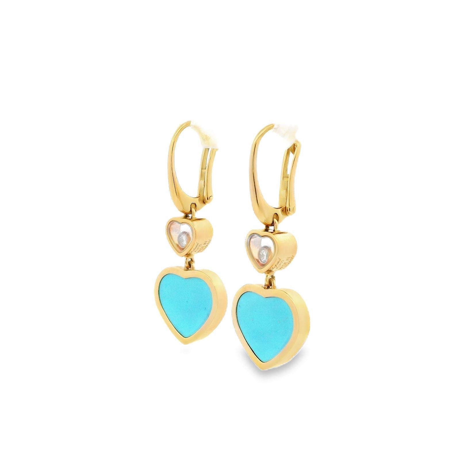 A pair of Chopard Happy Diamond turquoise heart shaped 18 karat yellow gold earrings

These elegant earrings are from Chopard's signature Happy Diamond collection.

Designed as two articulated heart shaped segments; with bezel set turquoise hearts