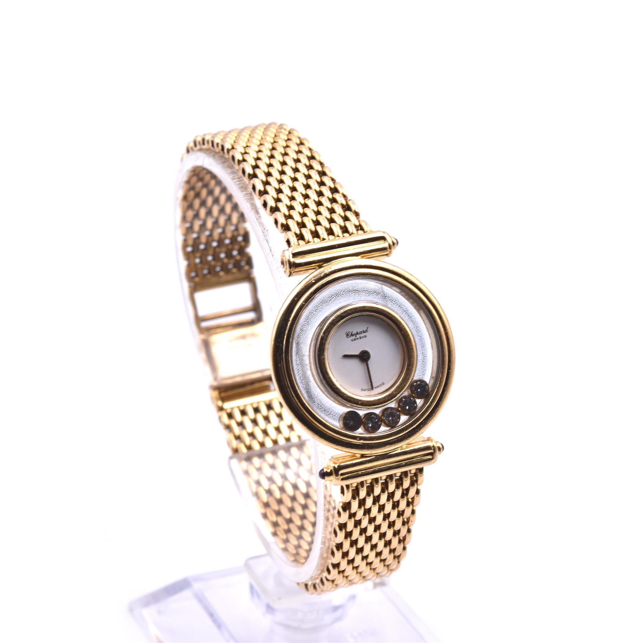 Movement: quartz
Function: hours, minutes
Case: 25mm 18k yellow gold case, floating diamonds bezel, sapphire protective crystal
Band: 18k yellow gold bracelet with double fold down clasps
Dial: white dial, gold hands
Reference #: 4101
Serial: