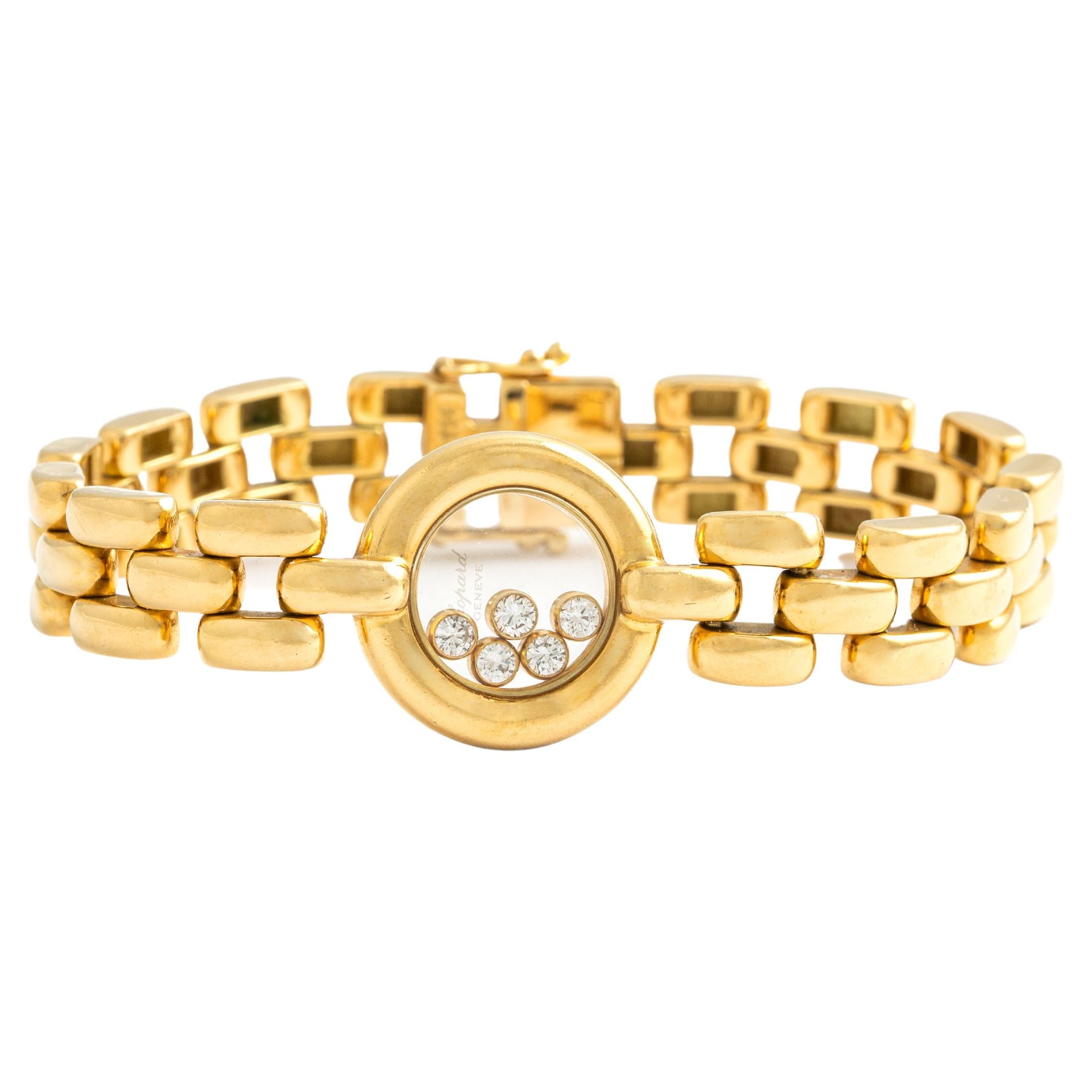 Chopard Happy Diamond yellow gold 18K Bracelet.
Signed Chopard.
We estimate in our opinion approximately 0.50 carat total diamond weight. Quality H color and Vs clarity.
Length: 15.00 centimeters.
Width: 0.90 centimeter.
Round screen diameter: 1.20