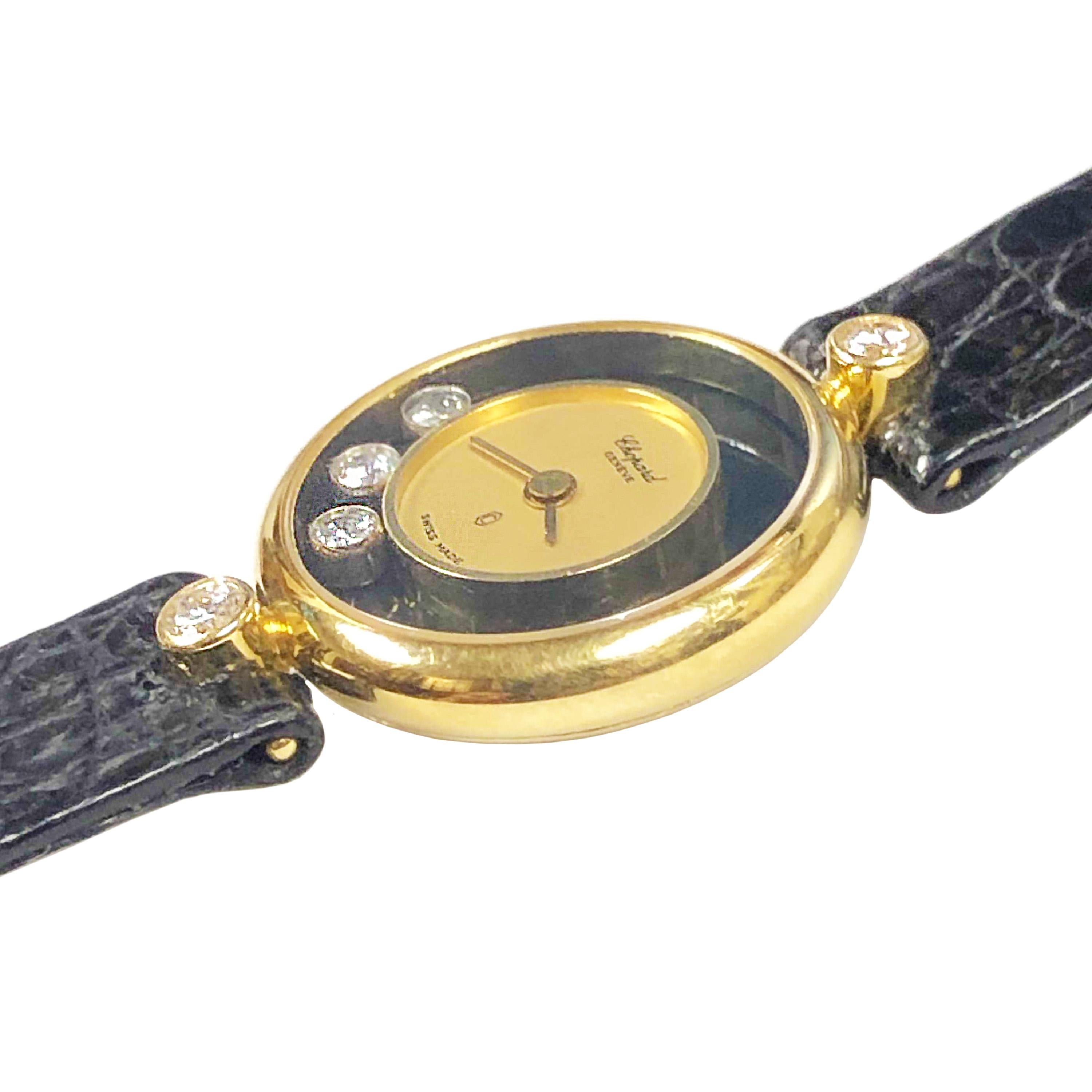 Circa 2000 ladies Chopard Happy Diamond collection Wrist watch, 21 MM 18K Yellow Gold case set with a Round Brilliant cut Diamond of .10 Ct. each set on each end of the case. Back set Quartz movement. Onyx and Gold Dial with 3 floating Diamonds