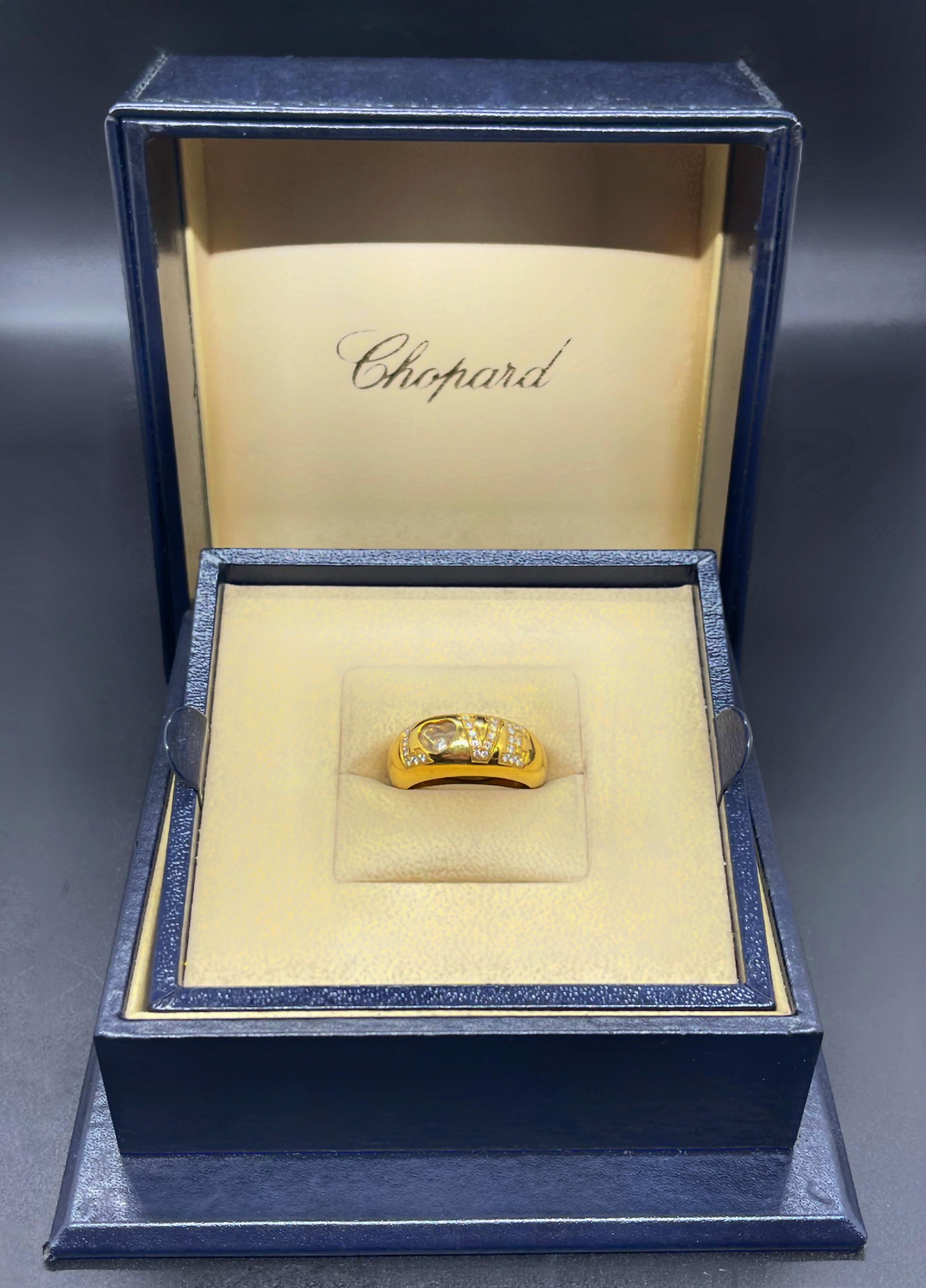 Chopard Happy diamonds Love ring. Crafted in  18K yellow gold. 24 round brilliant cut diamonds total an estimated 0.38 carats. The ring is stamped with a punch 750. 

The total weight: 11.1 grams.
EU size: 56
US size: 8

The ring can be resized on