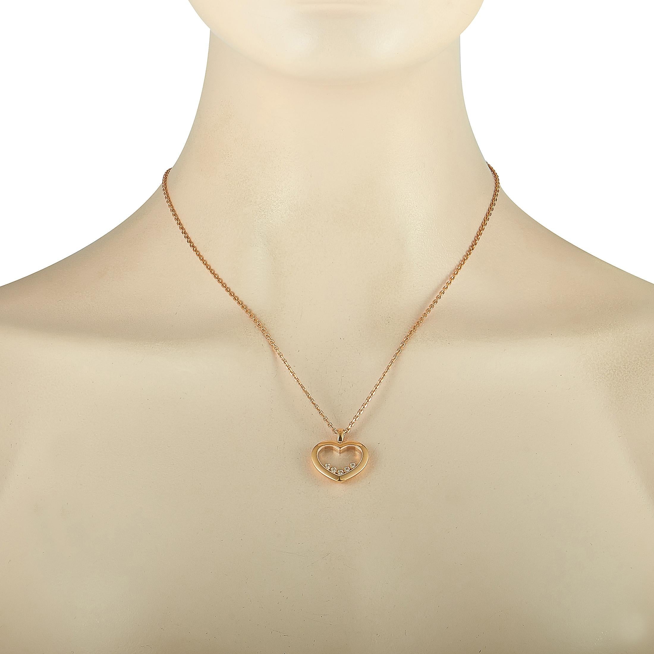 The Chopard “Happy Diamonds” necklace is made of 18K rose gold, boasting a 20” chain with lobster claw closure and a heart pendant that measures 0.87” in length and 0.80” in width. The necklace weighs 15.5 grams and features five floating diamond
