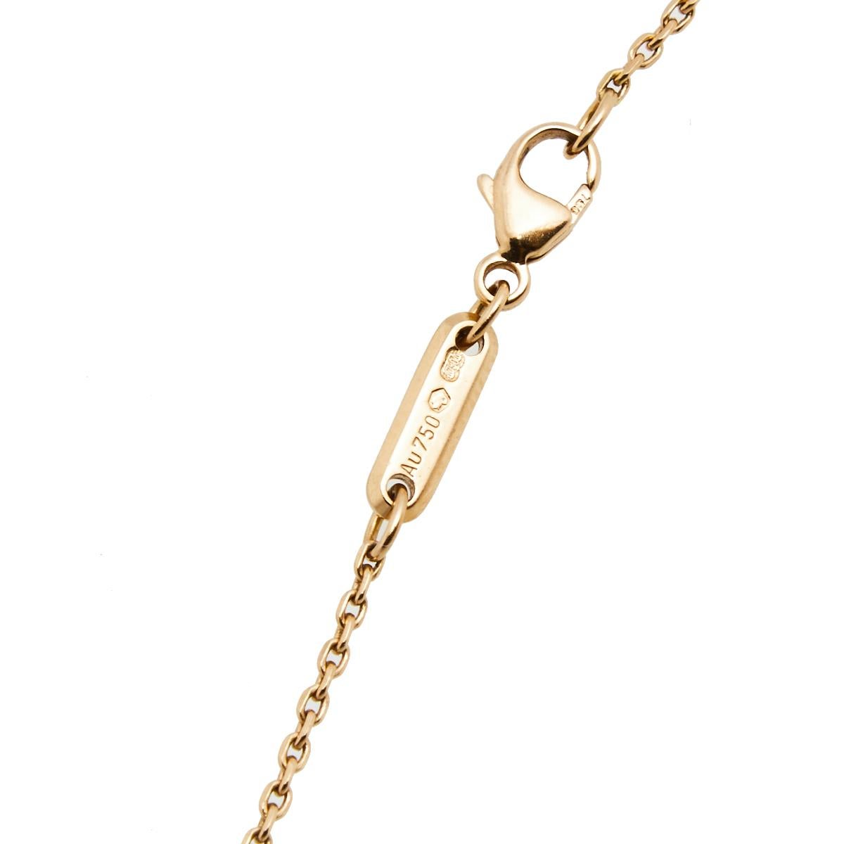 The house of Chopard presents an elegant and graceful necklace from their popular Happy Diamonds collection. It has an 18k rose gold chain with a pendant featuring an assembly of overlapping circles. One of the circles has a bezel lined with