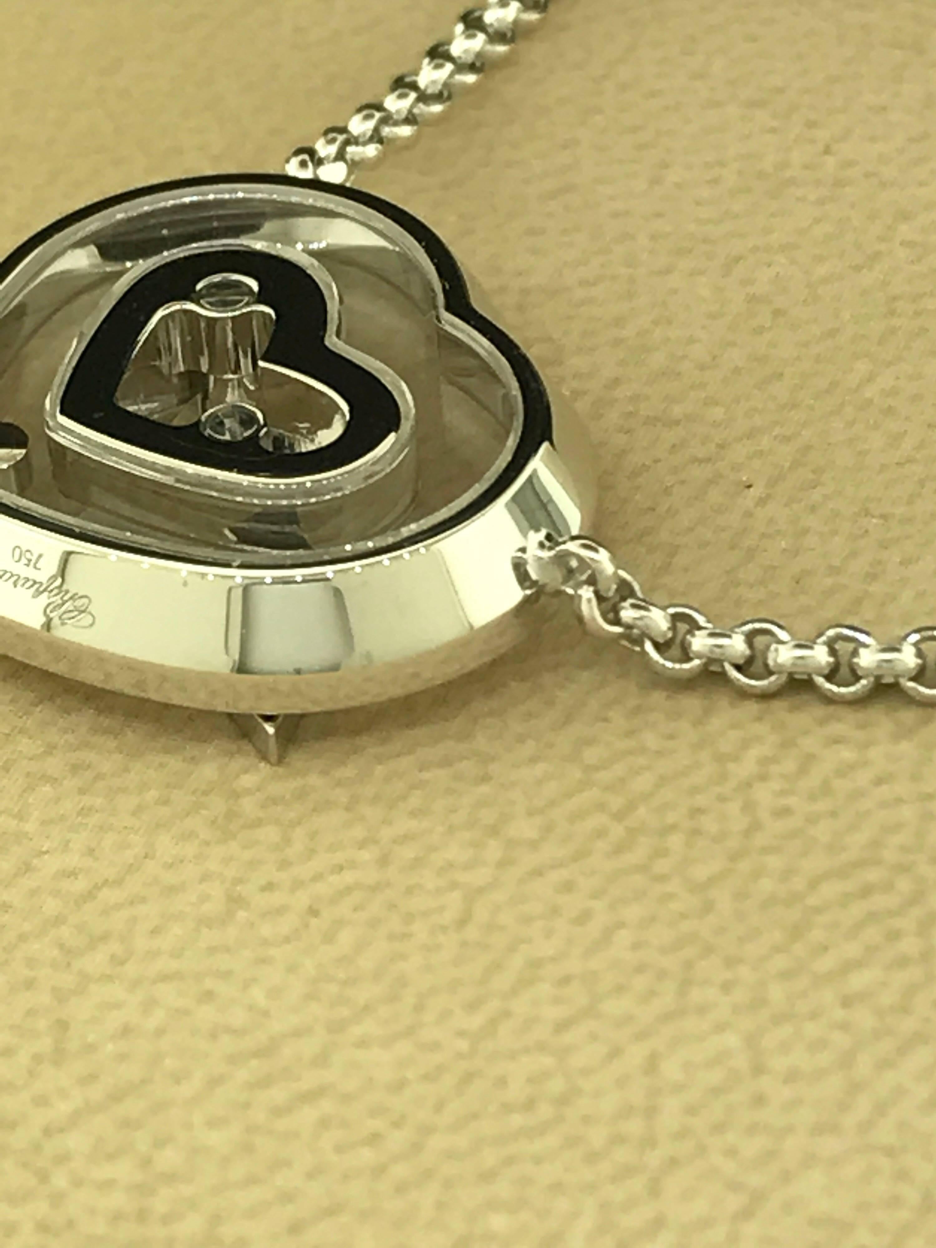 Chopard Happy Diamonds Heart Pendant Necklace

Model Number: 81/6599-1001

100% Authentic

Brand New

Comes with original Chopard box, certificate of authenticity and warranty, and jewels manual

18 Karat White Gold 18.10gr

1 Floating Diamond in