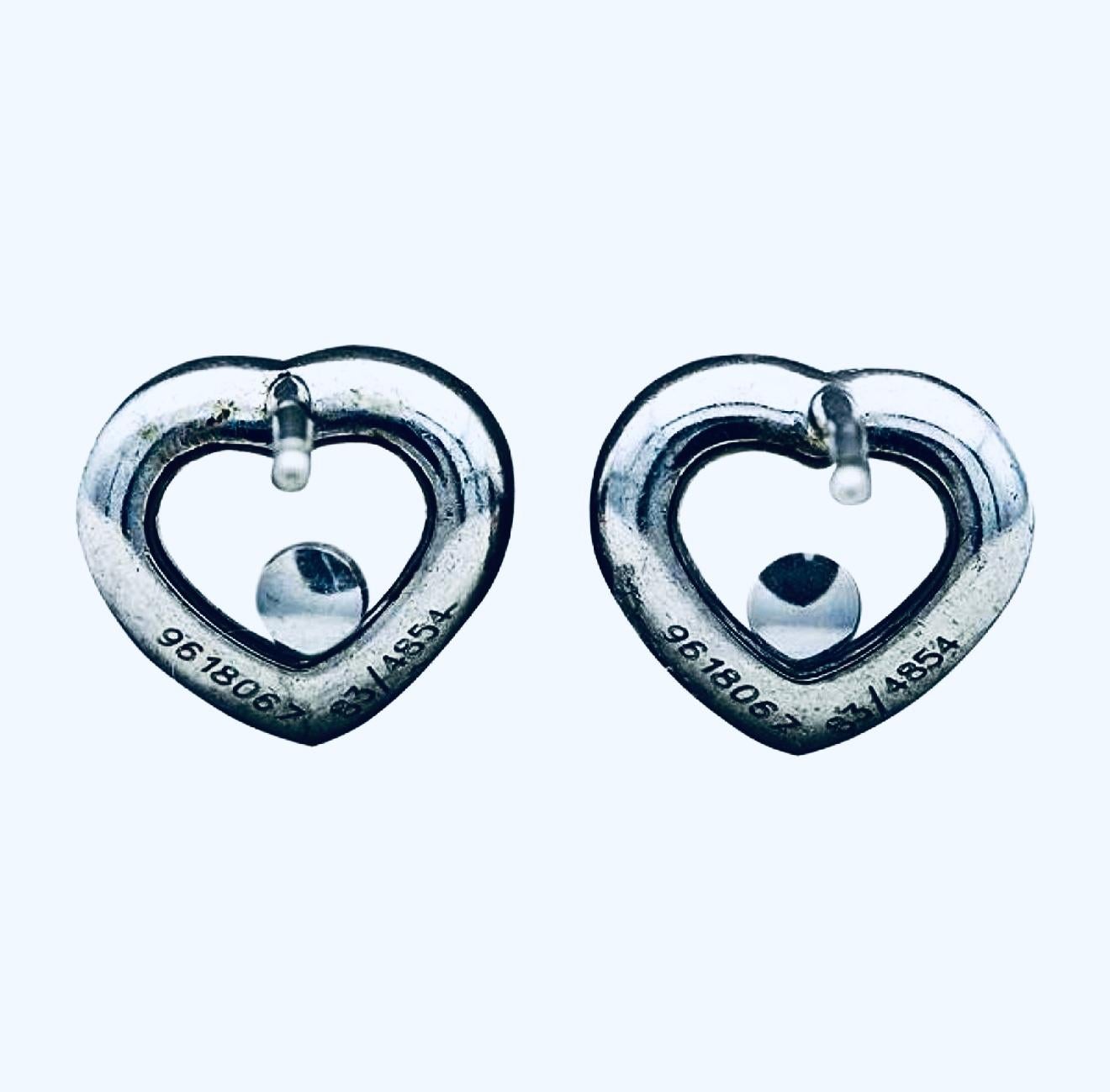 Taille ronde Chopard Happy Diamonds Boucles d'oreilles cœur en or blanc 18K 0.10 carats en vente