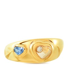 Chopard Happy Diamonds 18 Karat Gold Floating Diamond and Aquamarine Heart