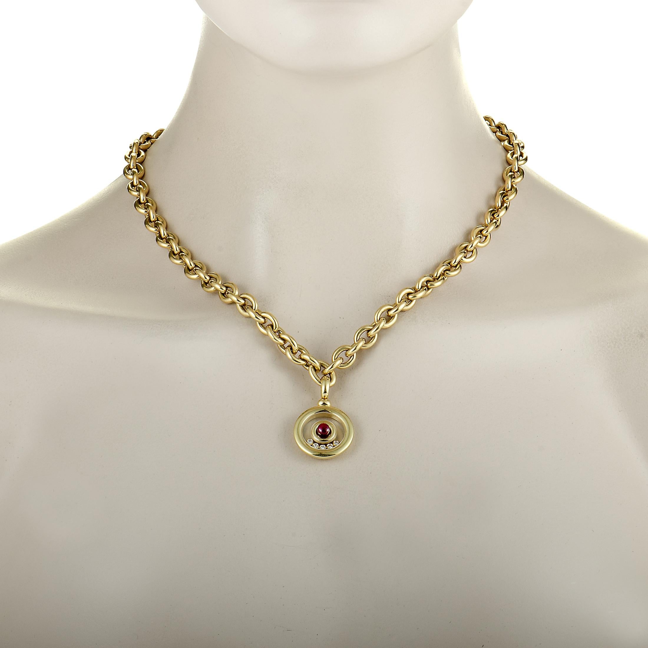 The Chopard “Happy Diamonds” vintage necklace is crafted from 18K yellow gold and embellished with a gemstone and floating diamonds. The necklace weighs 84.7 grams and features chain length of 18.00”, while the pendant measures 1.25” in length and