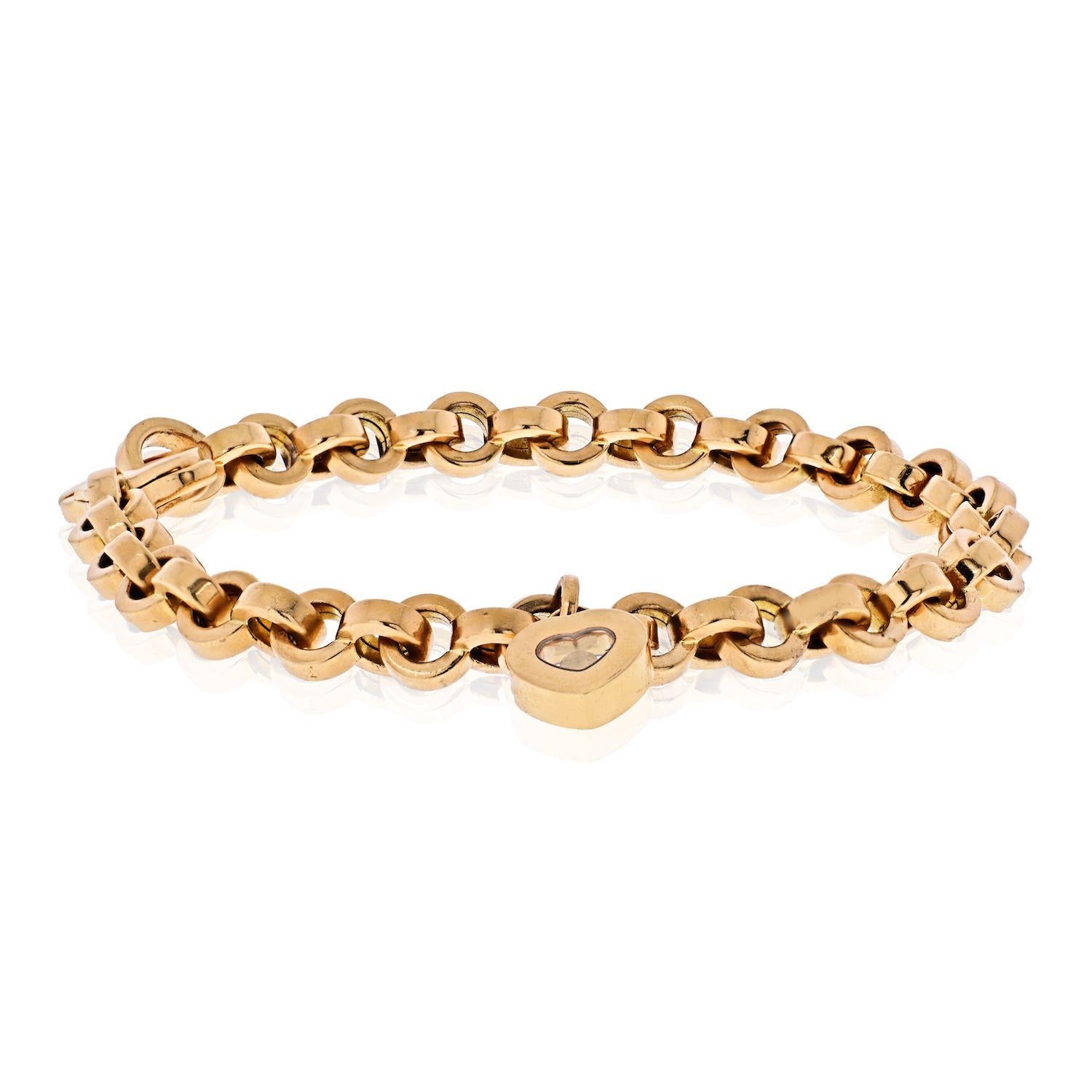 Chopard Happy Diamonds 18K Yellow Gold Heart Charm Link Bracelet.
Length: 8 inches.
Heart is set with one diamond.