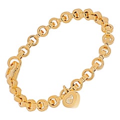 Chopard Happy Diamonds Bracelet à maillons en or jaune 18 carats avec breloques en forme de cœur