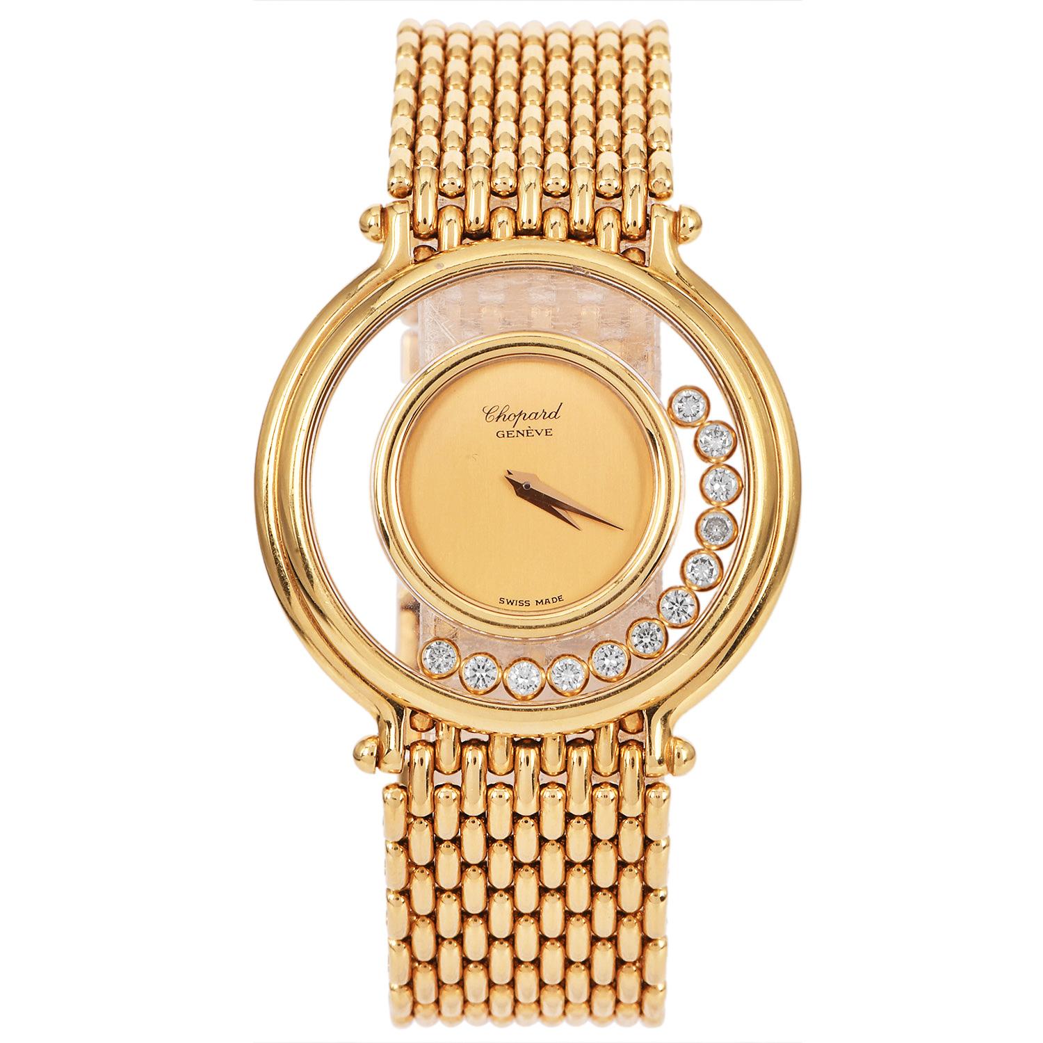 Introducing the elegant Extra large Chopard Happy Diamonds 18k Yellow Gold Women's Watch, Model 1153.

This luxurious timepiece features a 34mm yellow gold case and a matching 18mm gold bracelet that measures 7.75