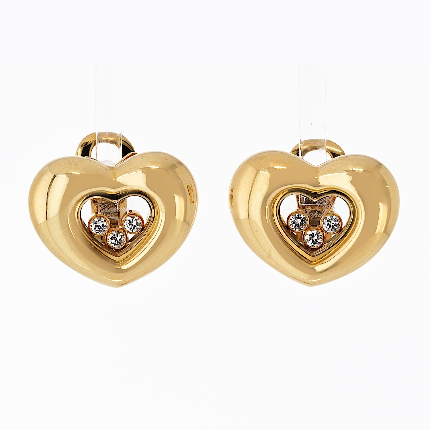 These elegant earrings from Chopard’s iconic Happy Diamonds collection are crafted in luxurious 18K yellow gold and feature three floating round brilliant diamonds per earring, totaling approximately 0.25 carats.

Measuring 20mm wide, the