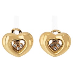 Pendientes Chopard Happy Diamonds de oro amarillo de 18 quilates con tres diamantes flotantes de 0,25 ctw