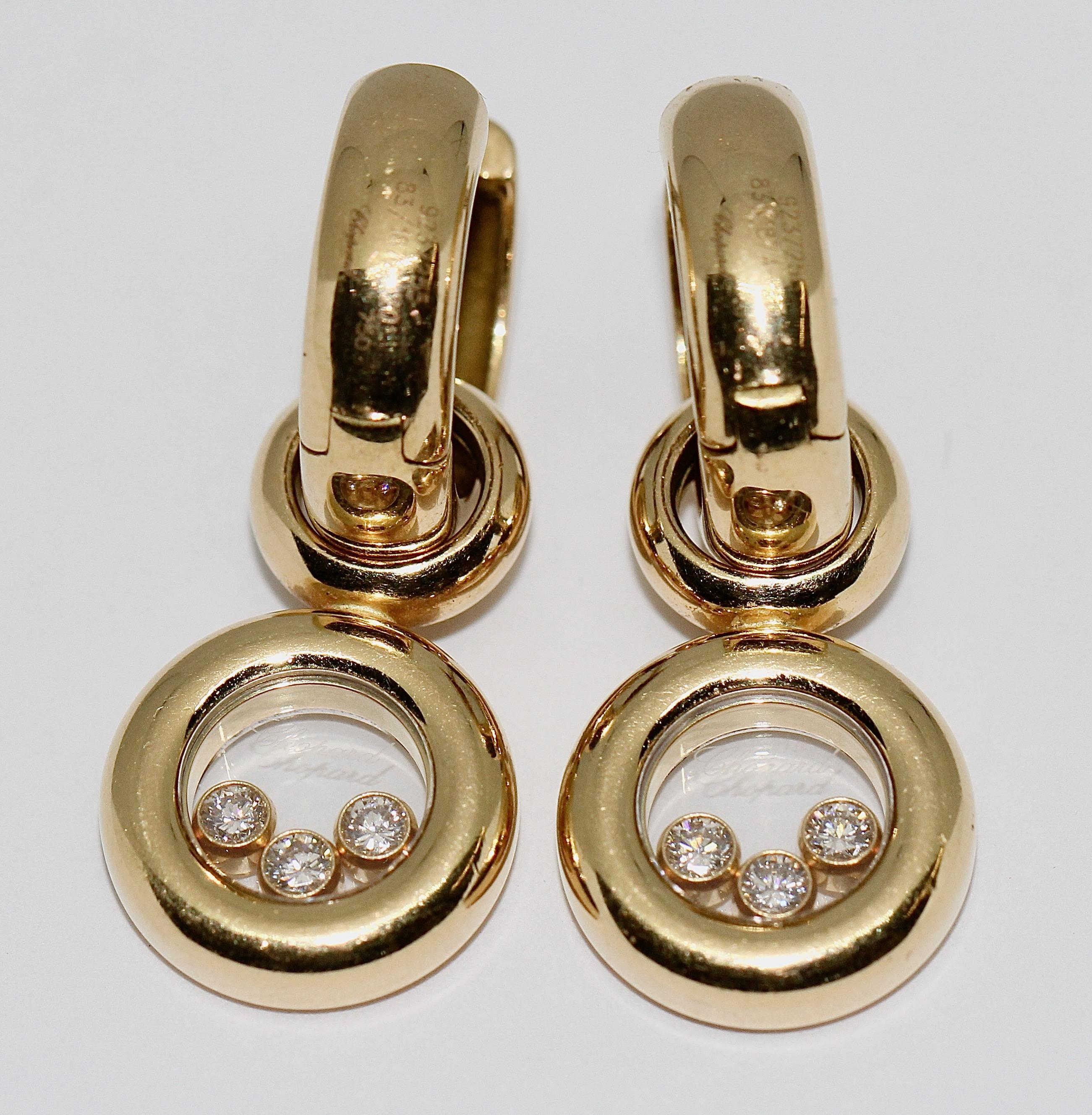 Chopard Happy Diamonds, dangle, drop earrings, 18 Karat gold.

Earrings can also be worn as a pendant, enhancer.

Including certificate of authenticity.