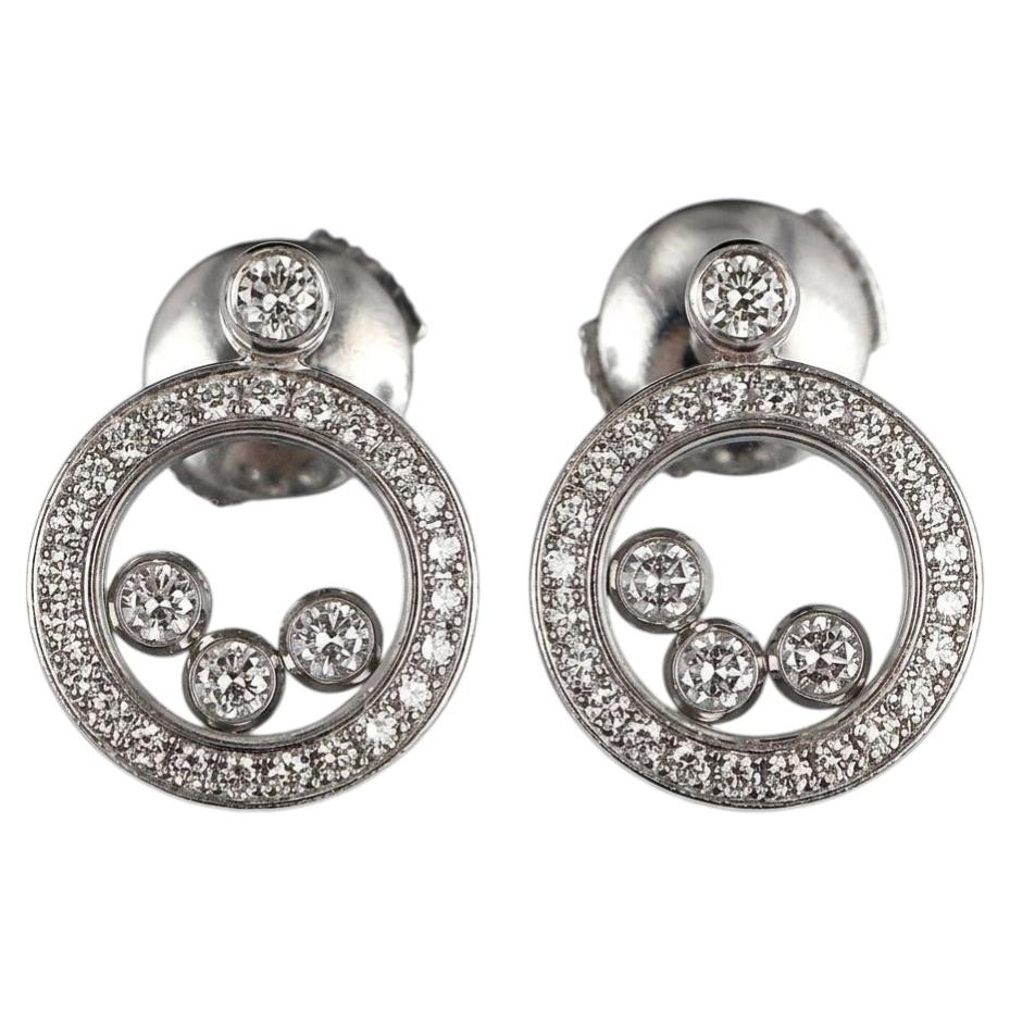 Orecchini a bottone Chopard Happy Diamonds con diamanti fluttuanti in oro bianco 18 carati