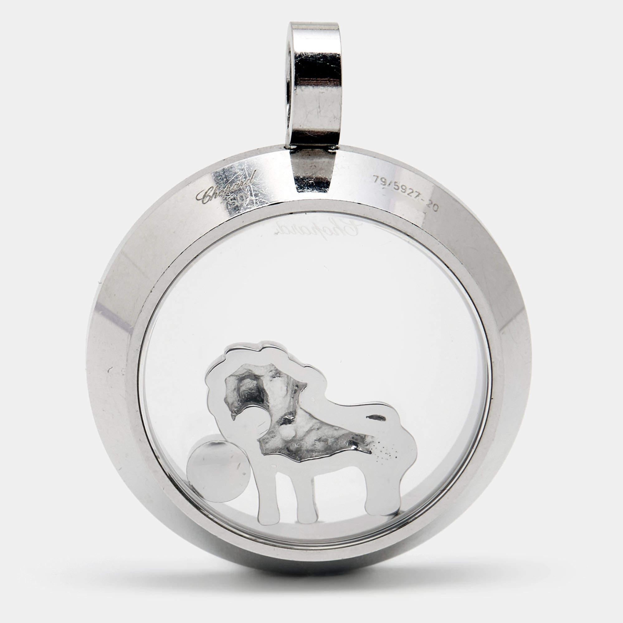 Chopard's Happy collection was inspired by drops of water and the free movement of the diamonds is a hallmark of the collection. This pendant is made from 18k white gold and features a floating lion motif within.

