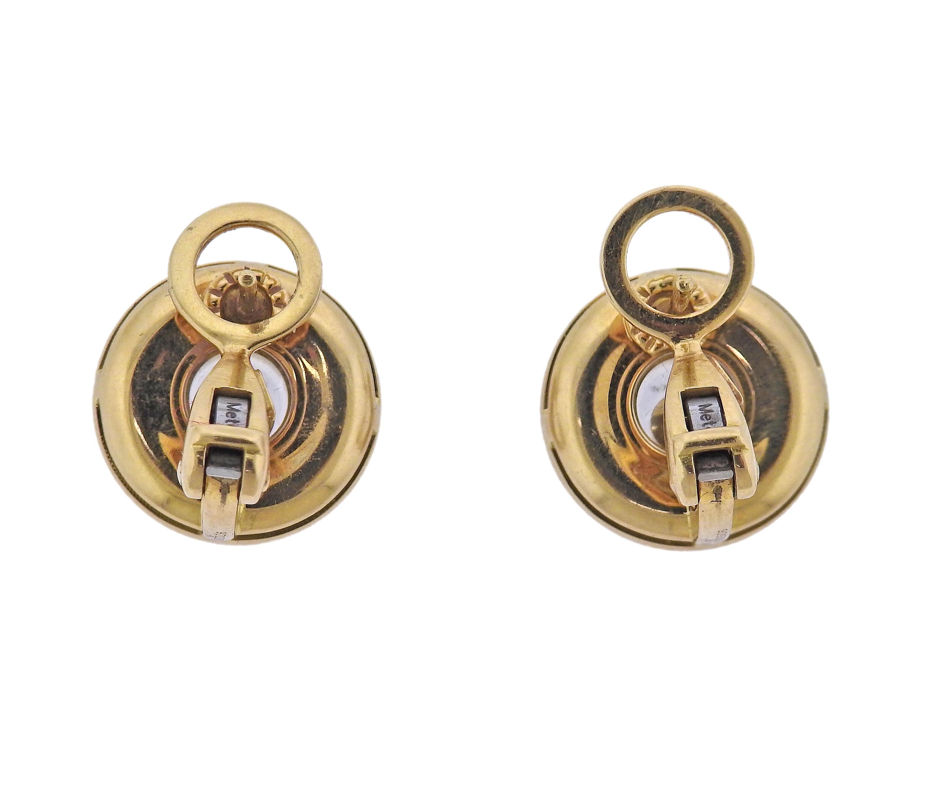 Pair of classic 18k gold earrings by Chopard, from Happy Diamonds collection, set with signature floating diamonds in the center. Earrings are 16mm in diameter. Diamonds total approx. 0.70ctw FG/VVS. Marked: LUC, 750, 9203864, Chopard, 84/1868-20.