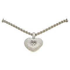 Used Chopard 'happy diamonds' golden necklace with diamonds.