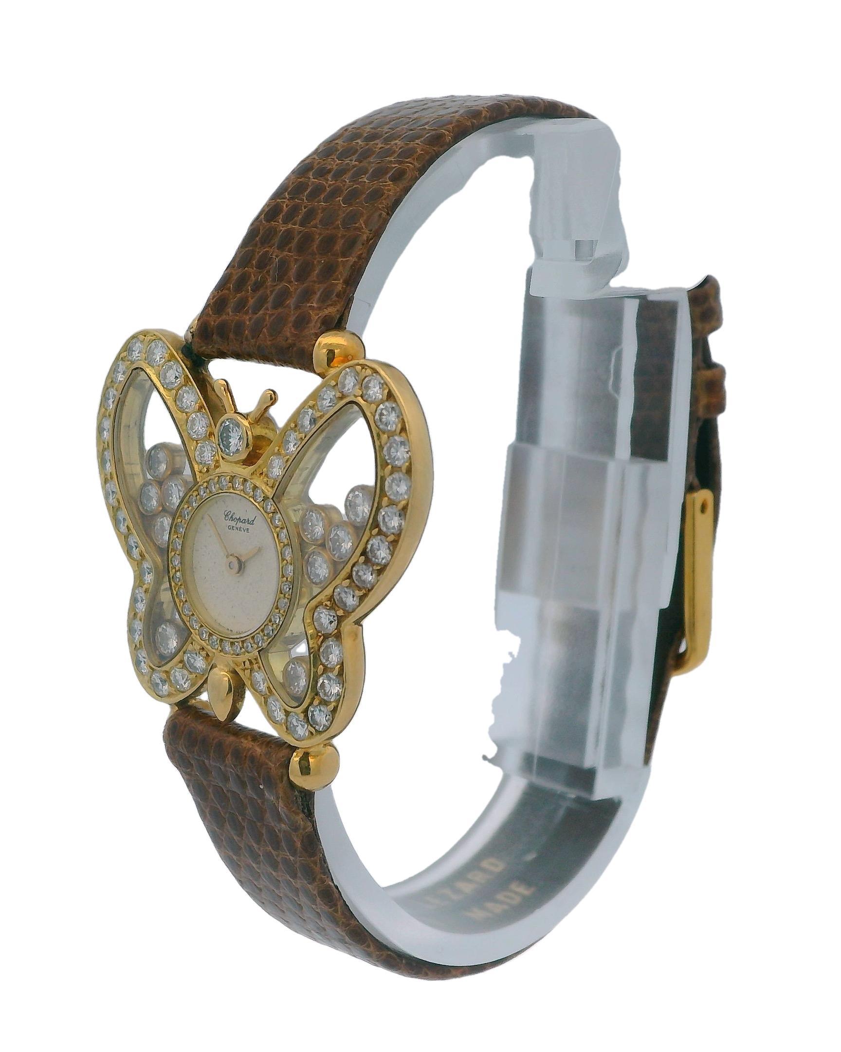 The Chopard Happy Diamonds Happy Butterfly Ladies' Watch is an elegant timepiece that beautifully combines luxury and whimsical design. The watch features a 30mm case made of 18k yellow gold, shaped like a butterfly, adorned with factory-set