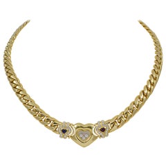 Vintage Chopard Happy Diamonds Heart Ruby, Sapphire Yellow Gold Necklace 18 Karat Gold