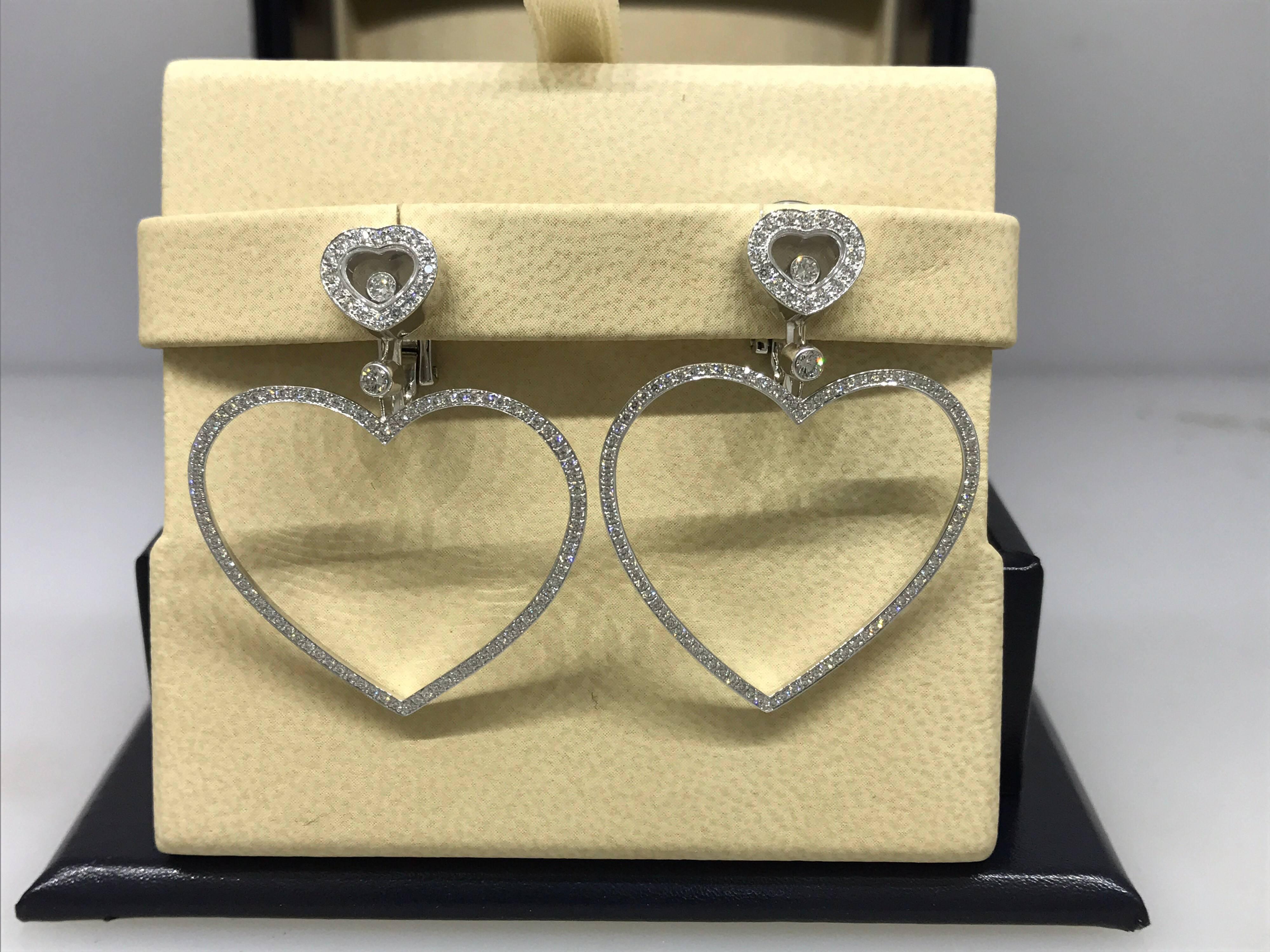 Chopard Happy Diamonds Large Heart Earrings

Model Number: 84/6467-1001

100% Authentic

Brand New

Comes with original Chopard box, certificate of authenticity and warranty, and jewels manual

18 Karat White Gold (13.60gr)

210 Diamonds total on
