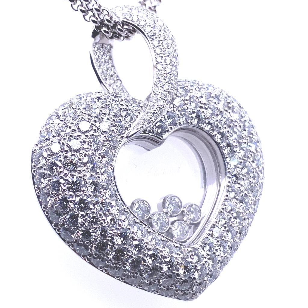 A Chopard Happy Diamonds Icons extra large heart pendant in 18 karat white gold together with chain.

This ultra rare limited edition elegant extra large heart shaped pendant and chain set is from Chopard's signature Happy Diamonds collection. Only