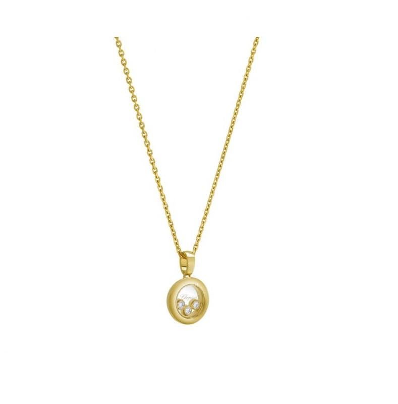 Chopard  HAPPY DIAMONDS ICONS PENDANT with 18k yellow gold and diamonds.  Inspired by sparkling drops of water in a waterfall, the 3 freely moving diamonds held between two sapphire crystals on this new round-shaped pendant in 18K yellow gold swirl