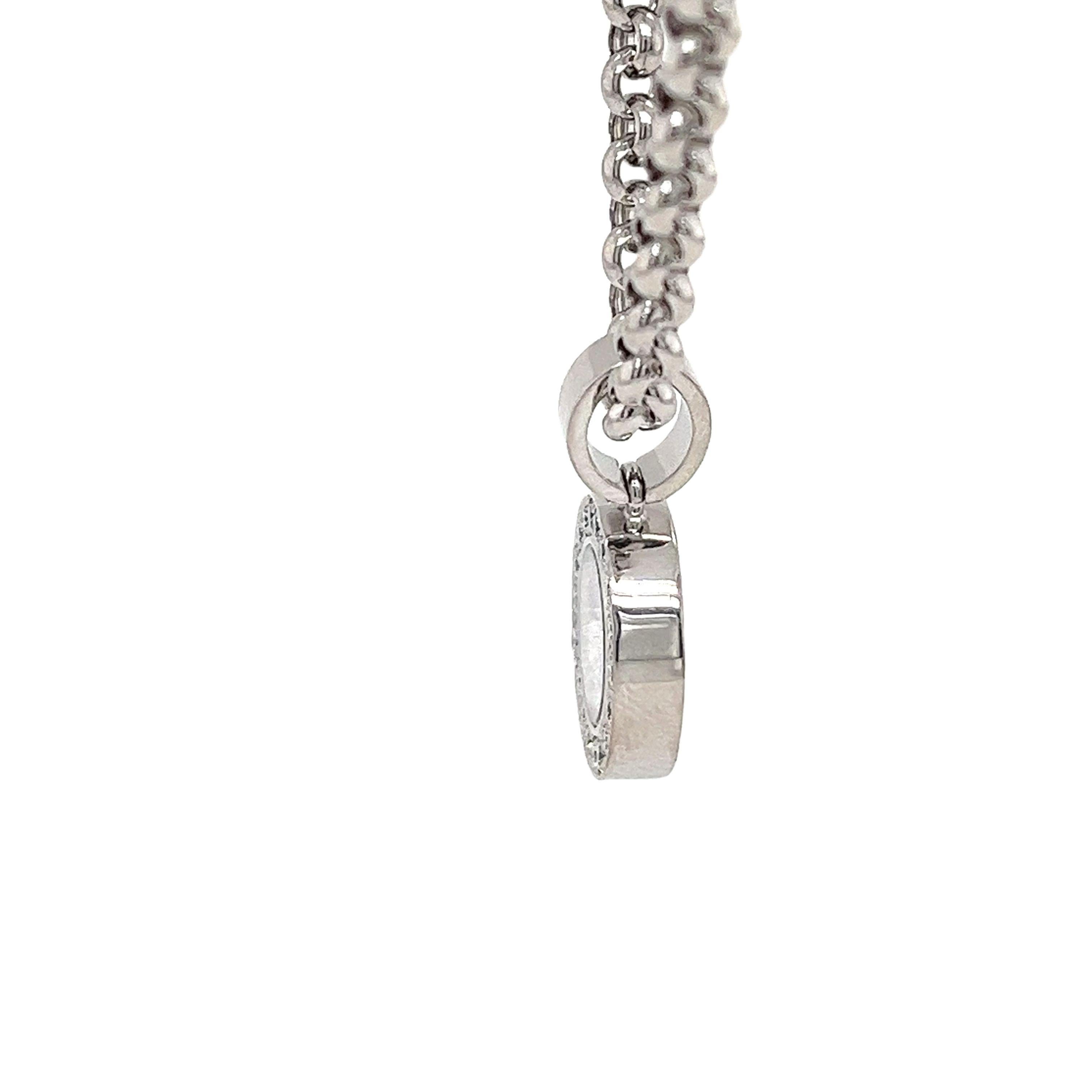 The Chopard Happy Diamonds Icons Round Pendant is a timeless and elegant piece crafted with Chopard’s signature artistry. Featuring a round design, this pendant showcases 3-floating diamonds encased between two sapphire crystals, offering a