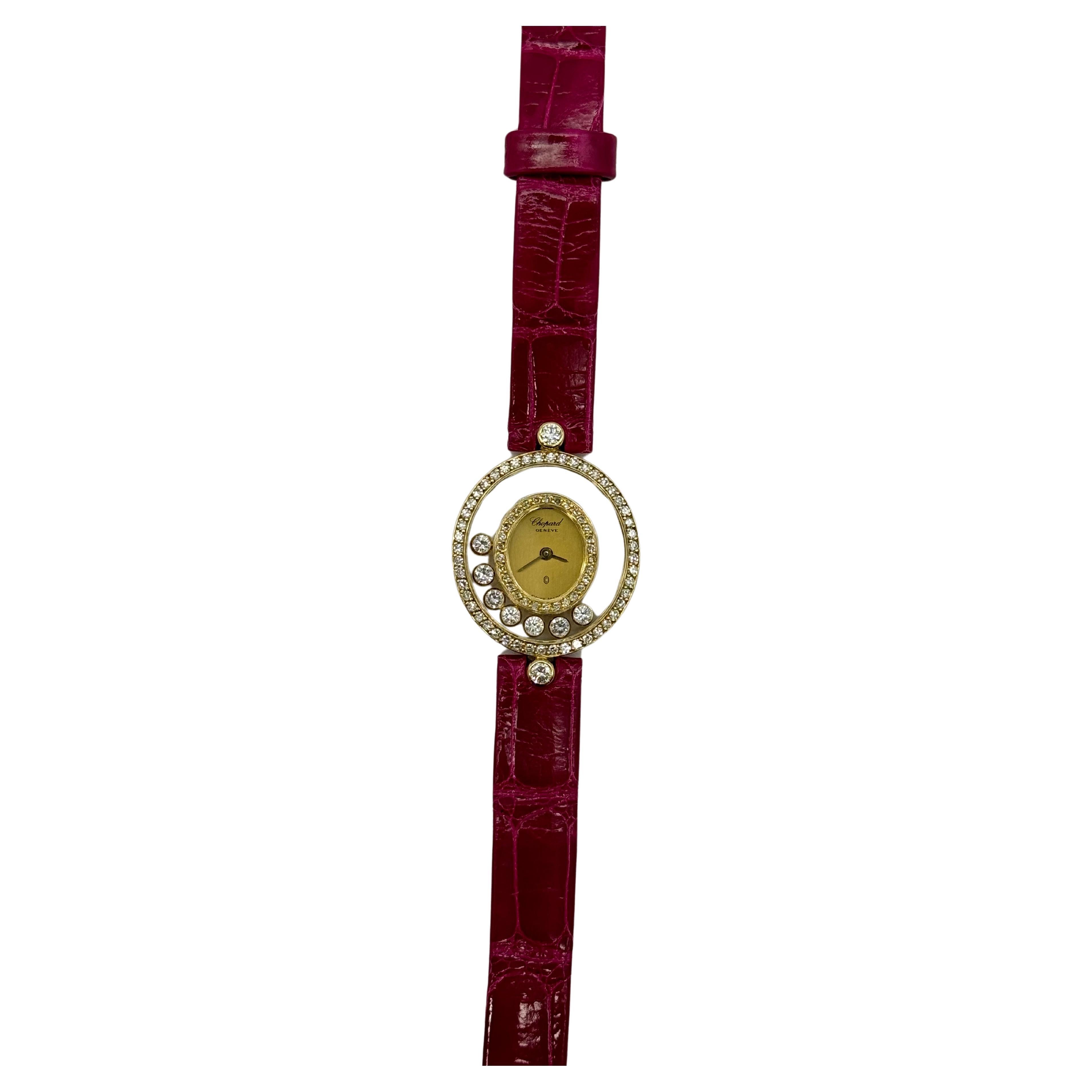 For sale is a stunning L.U. Chopard Geneve Happy Diamonds ladies' wristwatch. This exquisite timepiece comes with a pink leather strap and an additional black replacement strap. This beautiful hand-wound watch by Chopard includes an extra key to