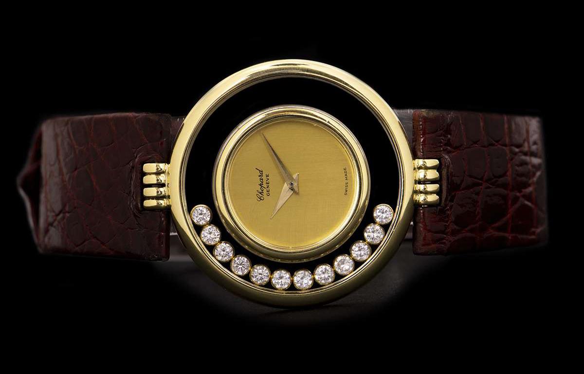 Chopard Happy Diamonds Ladies 18 Karat Yellow Gold Champagne Dial 21/2646 In Excellent Condition In London, GB