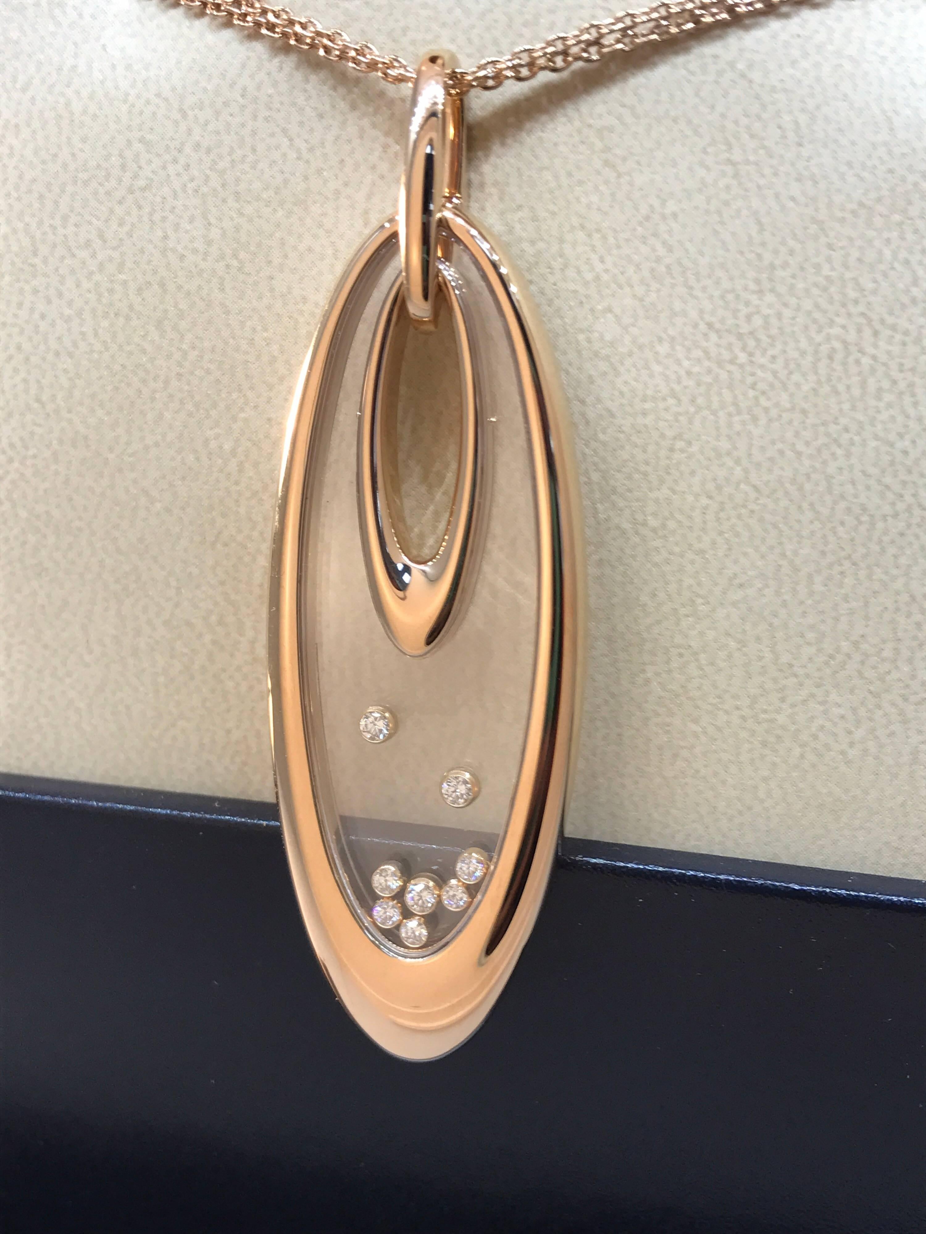 Chopard Happy Diamonds Large Oval Pendant / Necklace

Model Number: 79/7781-5001

100% Authentic

Brand New

Comes with original Chopard box, certificate of authenticity and warranty, and jewels manual

18 Karat Rose Gold (54.8gr)

3 Floating