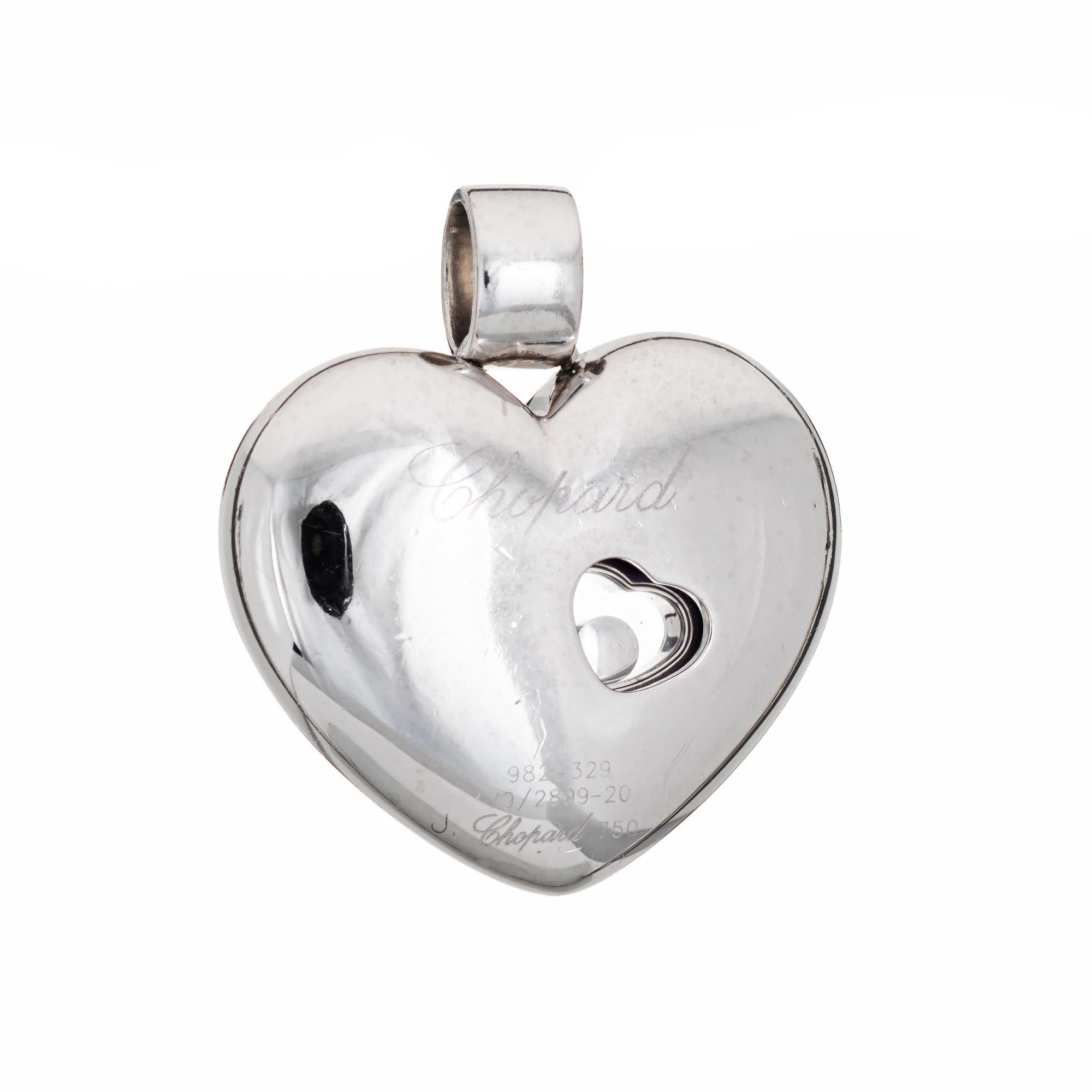 Pre-owned Chopard floating diamond heart pendant crafted in 18 karat white gold.  

Round brilliant cut diamonds total an estimated 0.25 carats (estimated at G-H color and VS2-SI1 clarity). 
From Chopard's Lucky Diamonds Collection the pendant