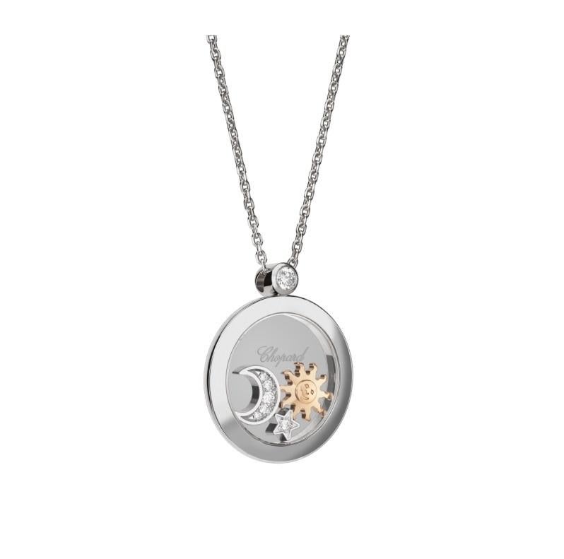 Chopard HAPPY DIAMONDS PENDANT with 18-carat rose gold, 18-carat white gold and diamonds. 
Adorned with fascinating astral moving elements, the Happy Diamonds pendant reveals a diamond-set 18K white gold dancing star and moon along with an 18K rose