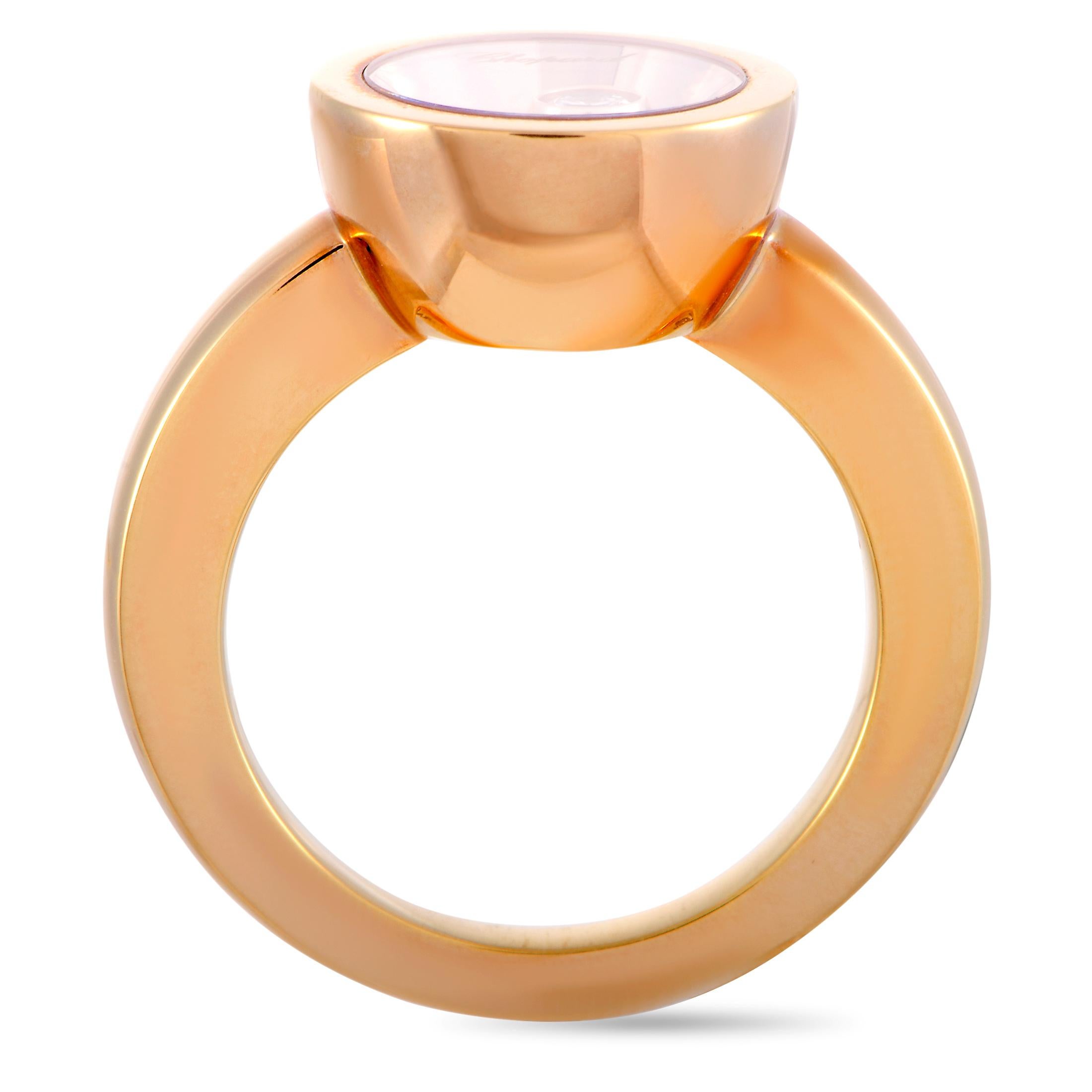 The Chopard “Happy Diamonds” ring is crafted from 18K rose gold and features a 0.10 ct floating diamond stone.  The ring weighs 13.1 grams, boasting band thickness of 2 mm and top height of 6 mm, while top dimensions measure 12 by 12 mm.

This item