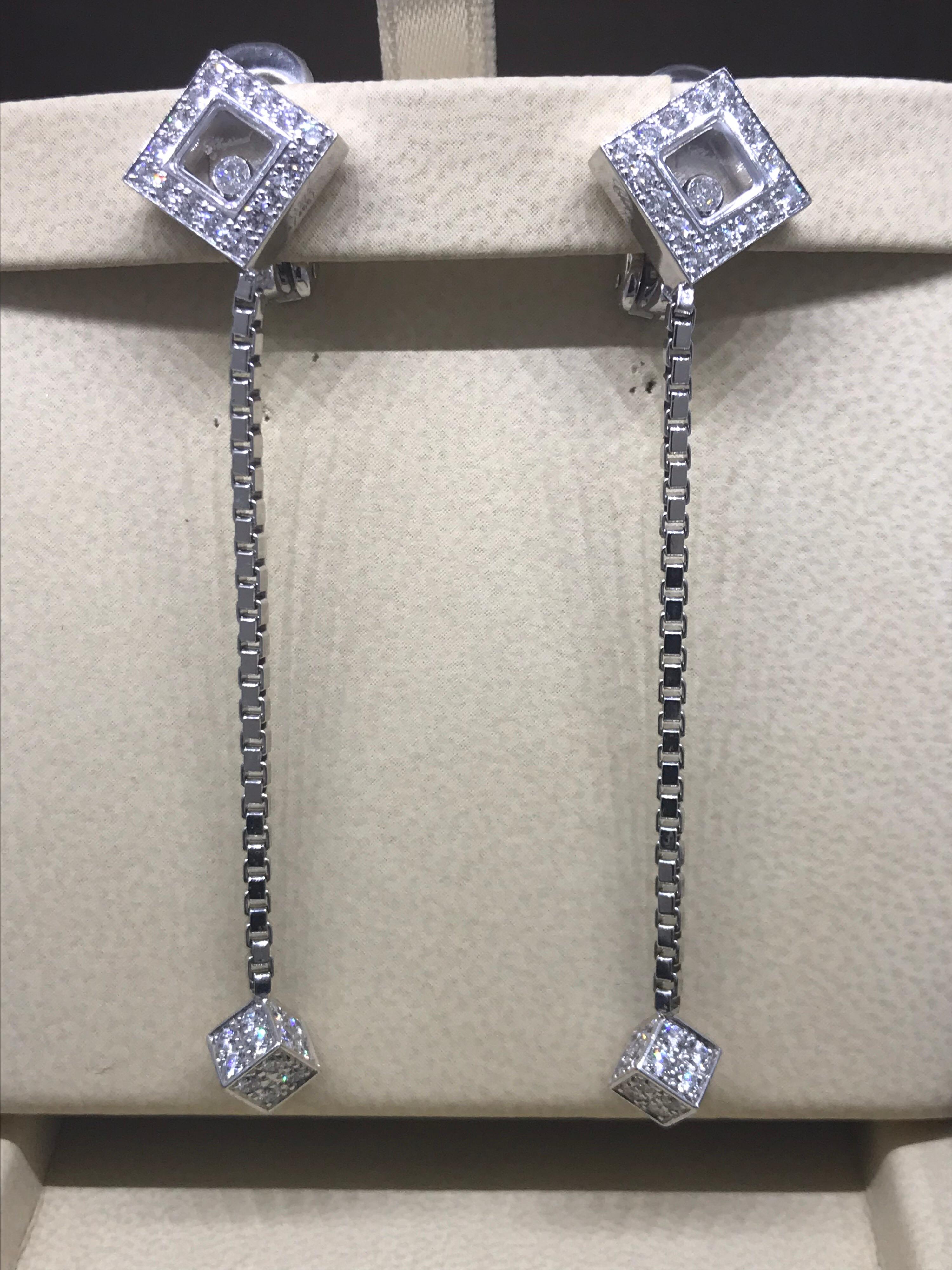 Chopard Happy Diamonds Square Earrings

Model  Number: 84/4667-1001

100% Authentic

New / Old Stock

Comes with original Chopard box, certificate of authenticity and warranty, and jewels manual

18 Karat White Gold

80 Diamonds on the earrings