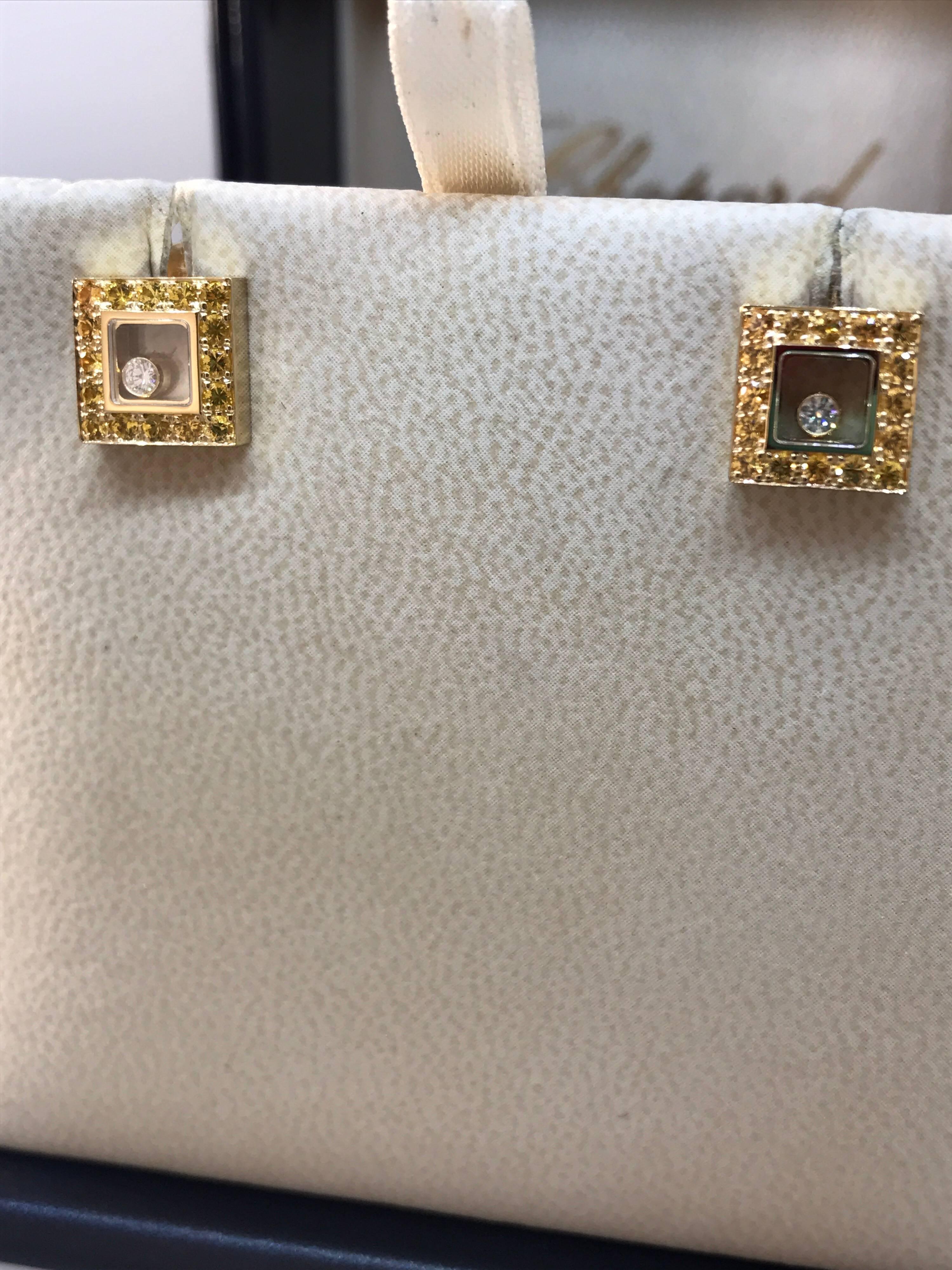 Chopard Happy Diamonds Square Earrings

Model Number: 83/2896-0004

100% Authentic

Brand New

Comes with original Chopard box, certificate of authenticity and warranty and jewels manual

18 Karat Yellow Gold (9.20gr)

16 Yellow Sapphires on each