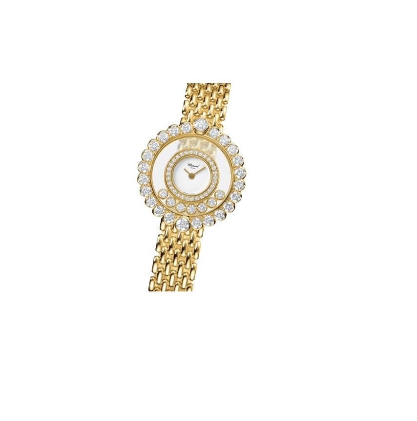 18 kt yellow gold case with a 18 kt yellow gold bracelet. Fixed 18 kt yellow gold bezel set with diamonds. White dial with 7 floating diamonds, gold-tone hands and no markers. hour markers. Dial Type: Analog. Quartz movement. Scratch resistant