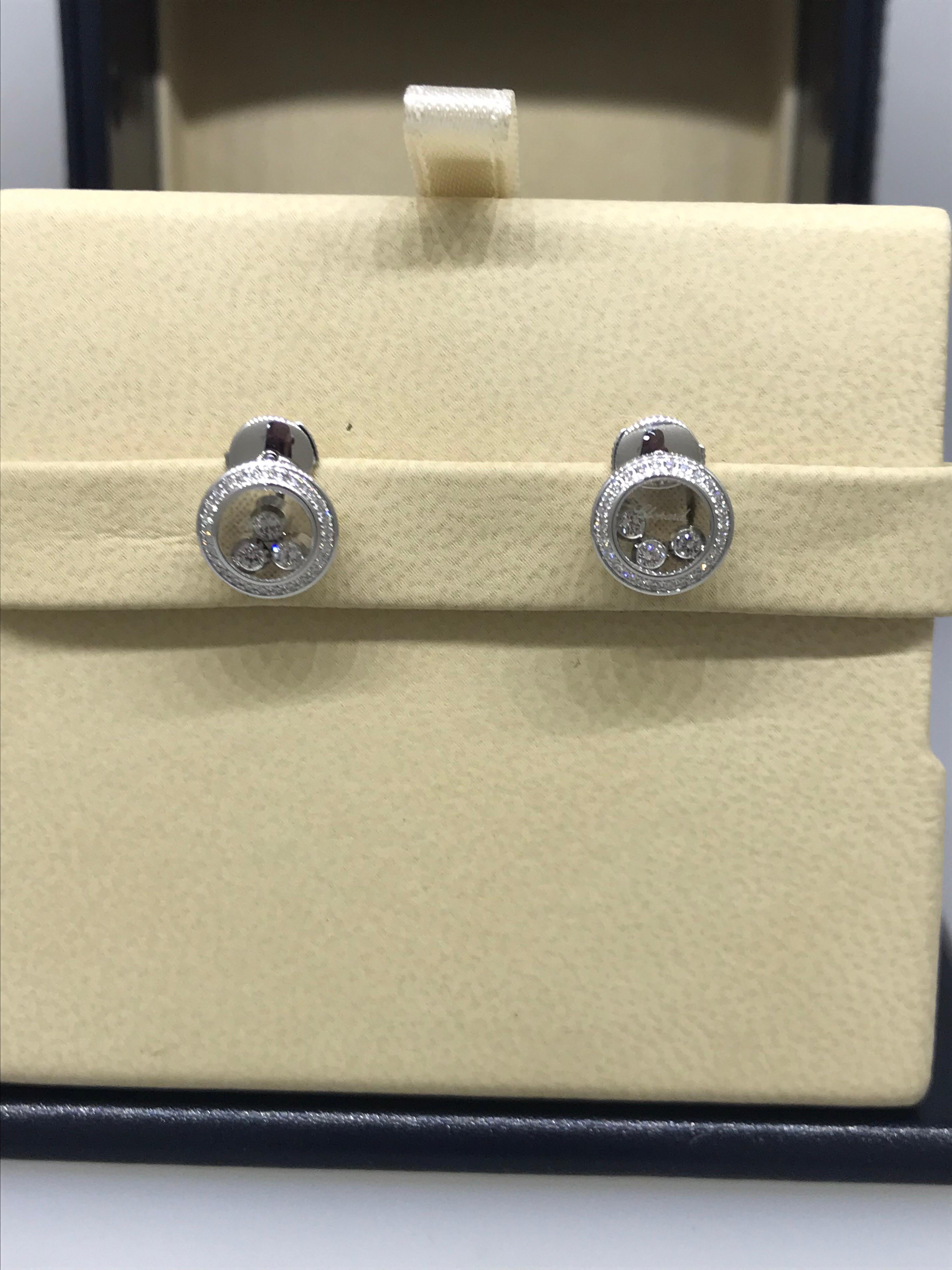 Chopard Happy Diamonds Earrings

Model Number: 83/9562-1002

100% Authentic

Brand New

Comes with original Chopard box, certificate of authenticity and warranty, and jewels manual

18 Karat white gold (4.14gr)

52 Diamonds on the Earrings (.15