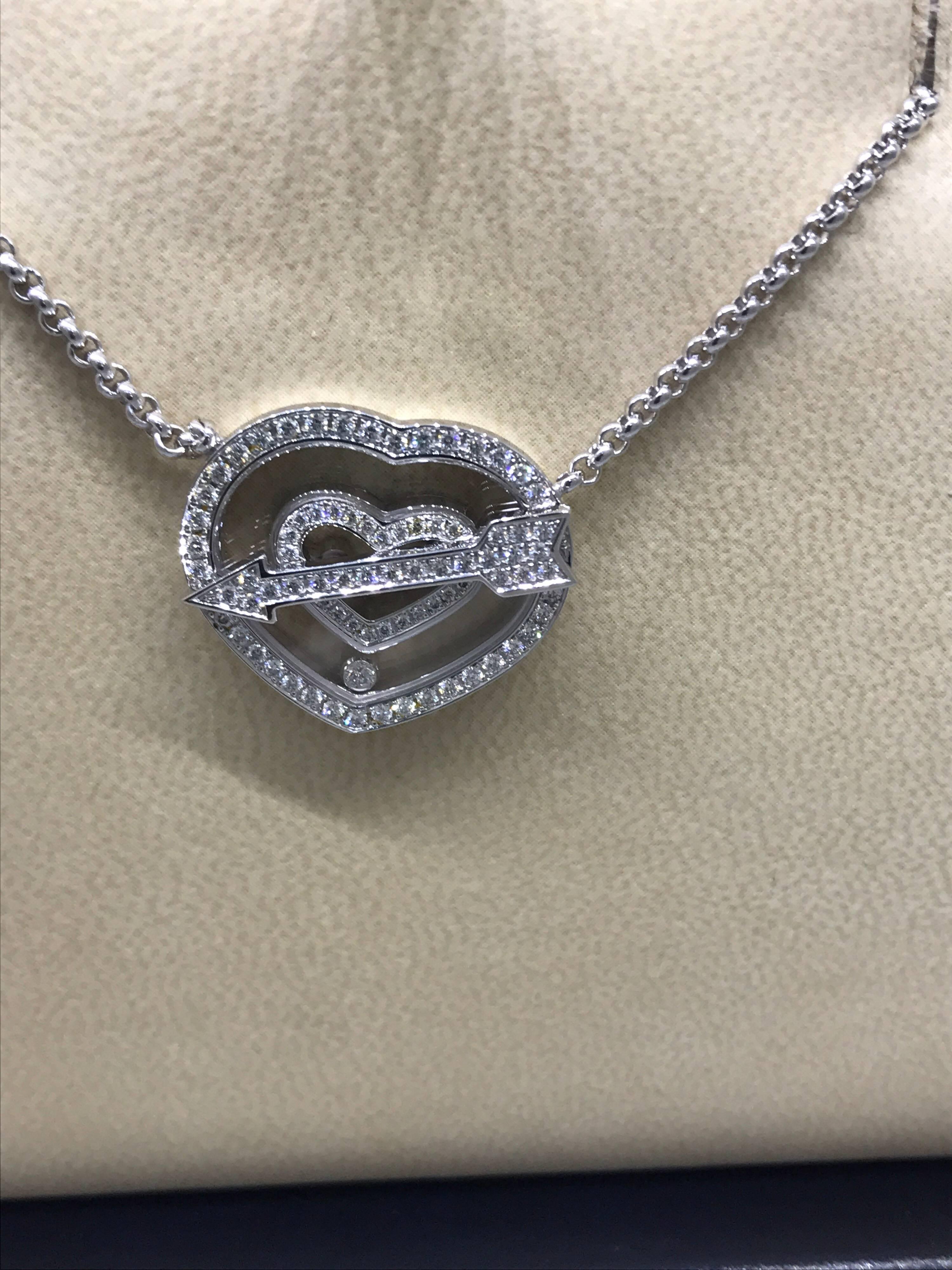 Chopard Happy Diamonds Heart Pendant Necklace

Model Number: 81/6599-1002

100% Authentic

Brand New

Comes with original Chopard box, certificate of authenticity and warranty, and jewels manual

18 Karat White Gold 18.10gr

79 Diamonds on the