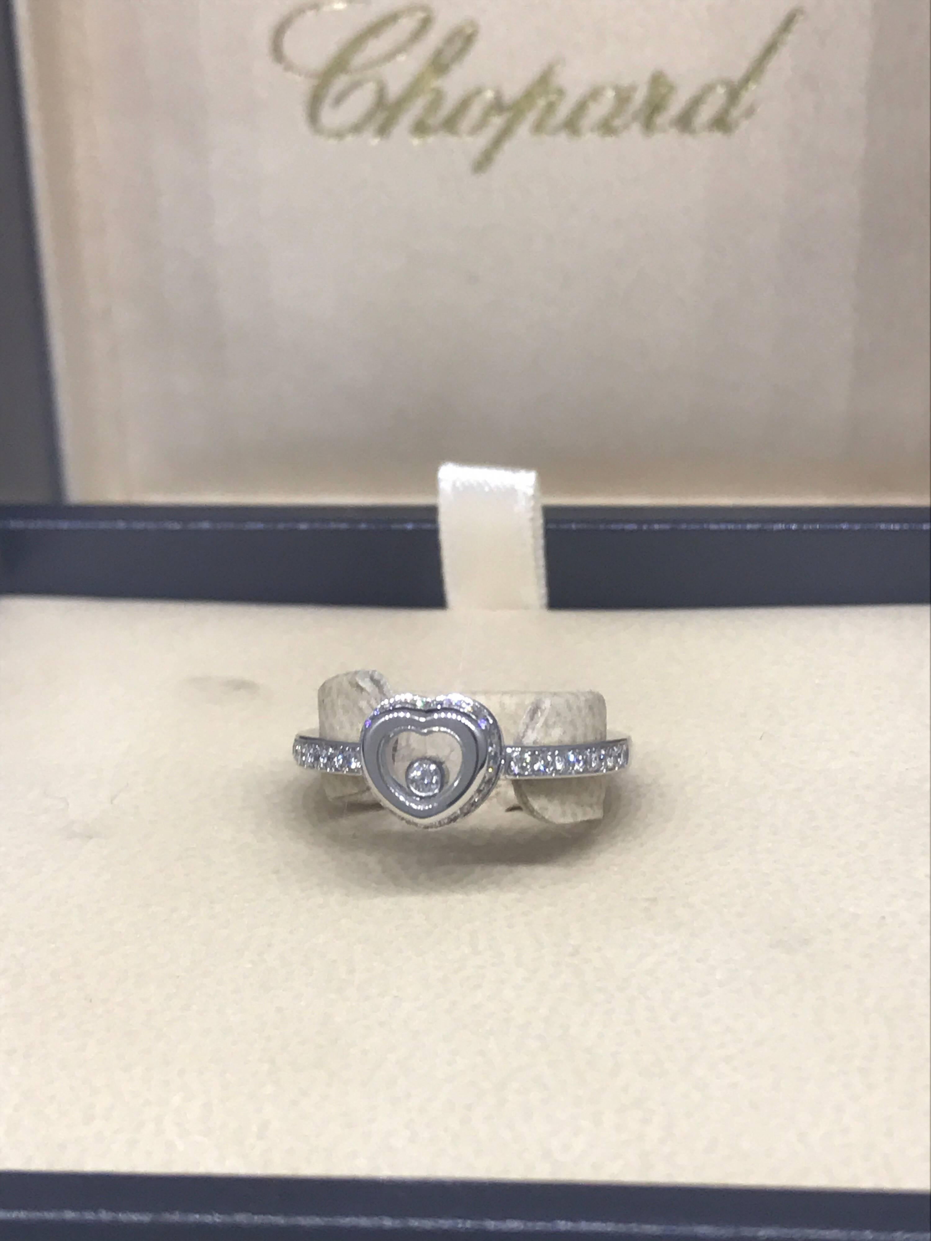 Chopard Happy Diamonds Heart Ring

Model Number: 82/9009-1110

100% Authentic

Brand New

Comes with original Chopard box, certificate of authenticity and warranty, and jewels manual

18 Karat White Gold (5.20gr)

30 Diamonds on the ring (.21