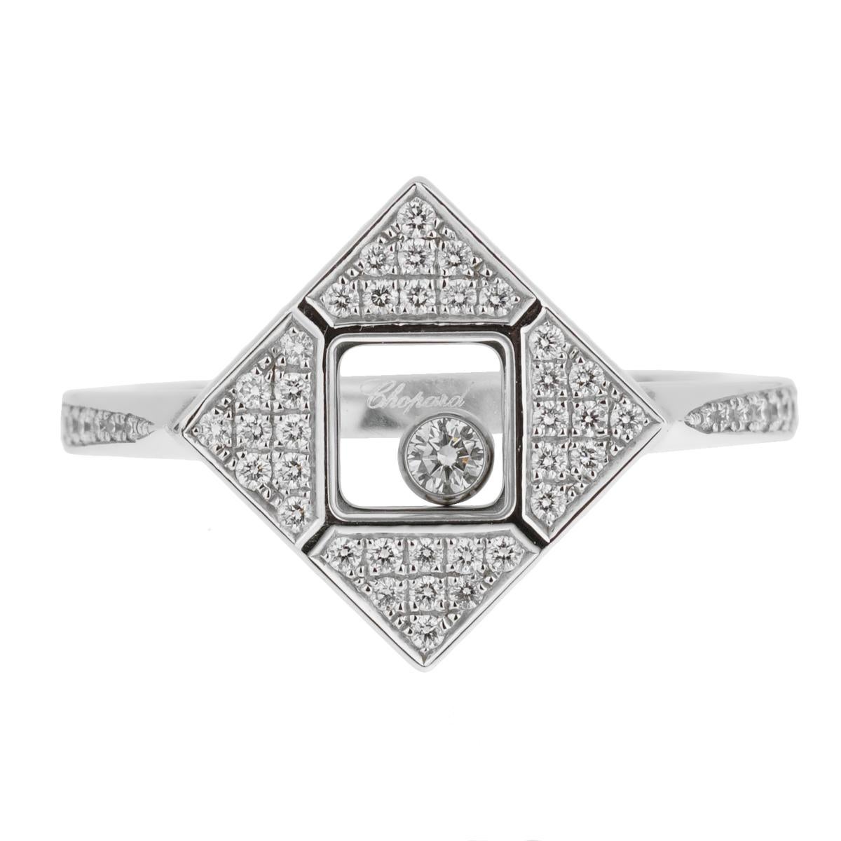 A chic Chopard diamond ring from the Happy Diamonds collection featuring a 54 round brilliant cut diamonds surrounding a floating diamond in 18k white gold.

Size 6 3/4
Sku: 1732