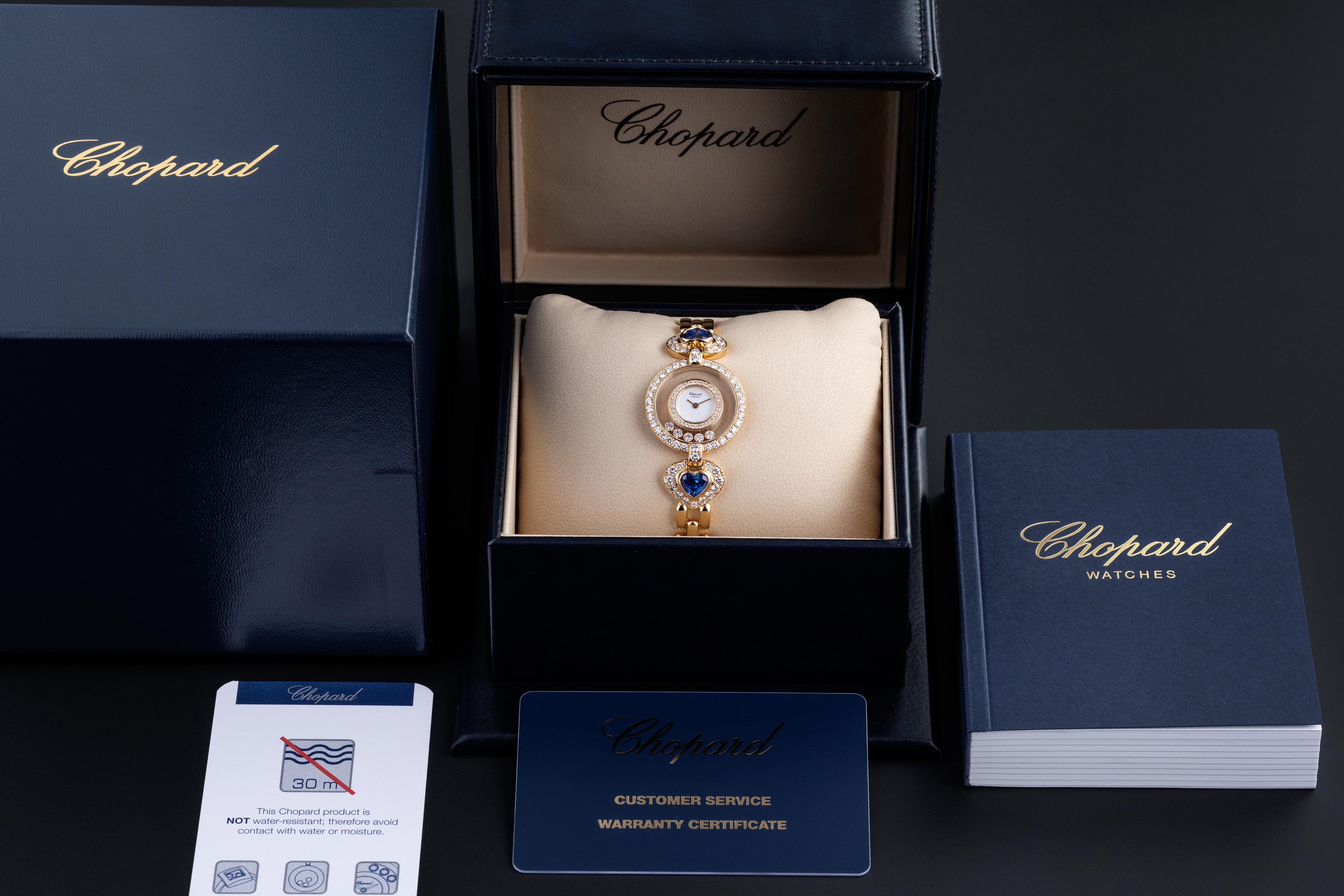 Chopard has been producing the Happy Diamonds collection since 1976 displaying floating diamonds between two layers of sapphire. This stunning Joaillerie piece in 18ct yellow gold, features five of these floating diamonds (0.28cts) against a