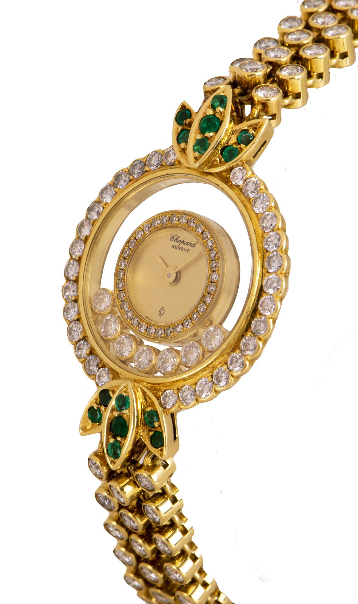 A 25 mm 18k Yellow Gold Happy Diamonds Ladies Wristwatch, champagne dial with an 18k yellow gold inner bezel set with approximately 32 round brilliant cut diamonds (~0.16ct), an 18k yellow gold outer bezel set with approximately 30 round brilliant