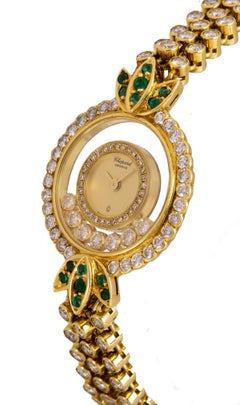Chopard Happy Diamonds Yellow Gold Champagne Dial Diamond and Emerald Set Watch