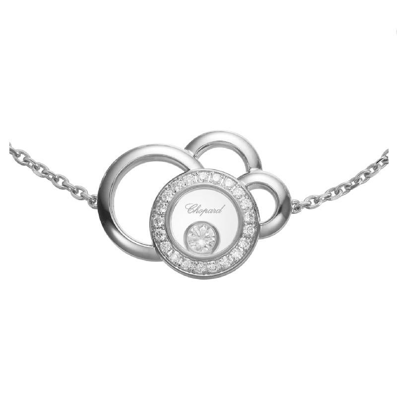 Chopard  HAPPY DREAMS BRACELET with 18-carat white gold and diamonds. This elegant bracelet features four 18-carat white gold circles of varying sizes that appear irregularly superimposed to resemble a cloud suspended delicately in the sky. The