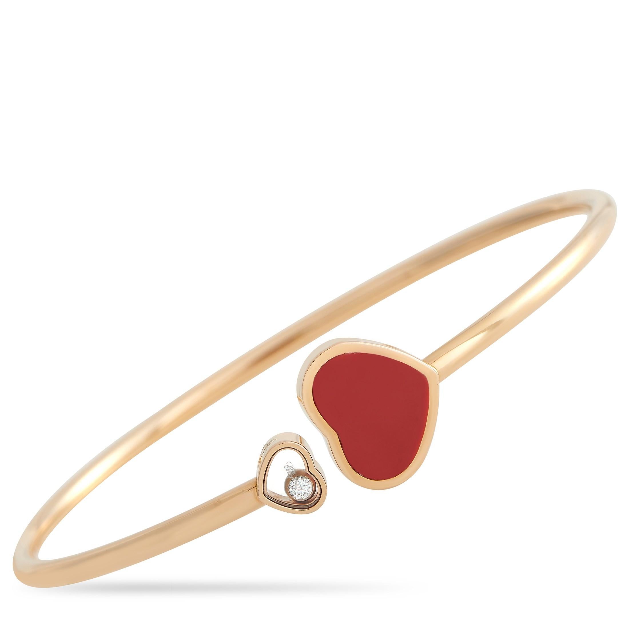 Celebrate love with this Chopard Happy Hearts 18K rose gold bracelet. This structured wrist accessory is made from 18K rose gold and features the Swiss Maison's iconic dancing diamond. Set in a small heart with sapphire glass panes is a dancing