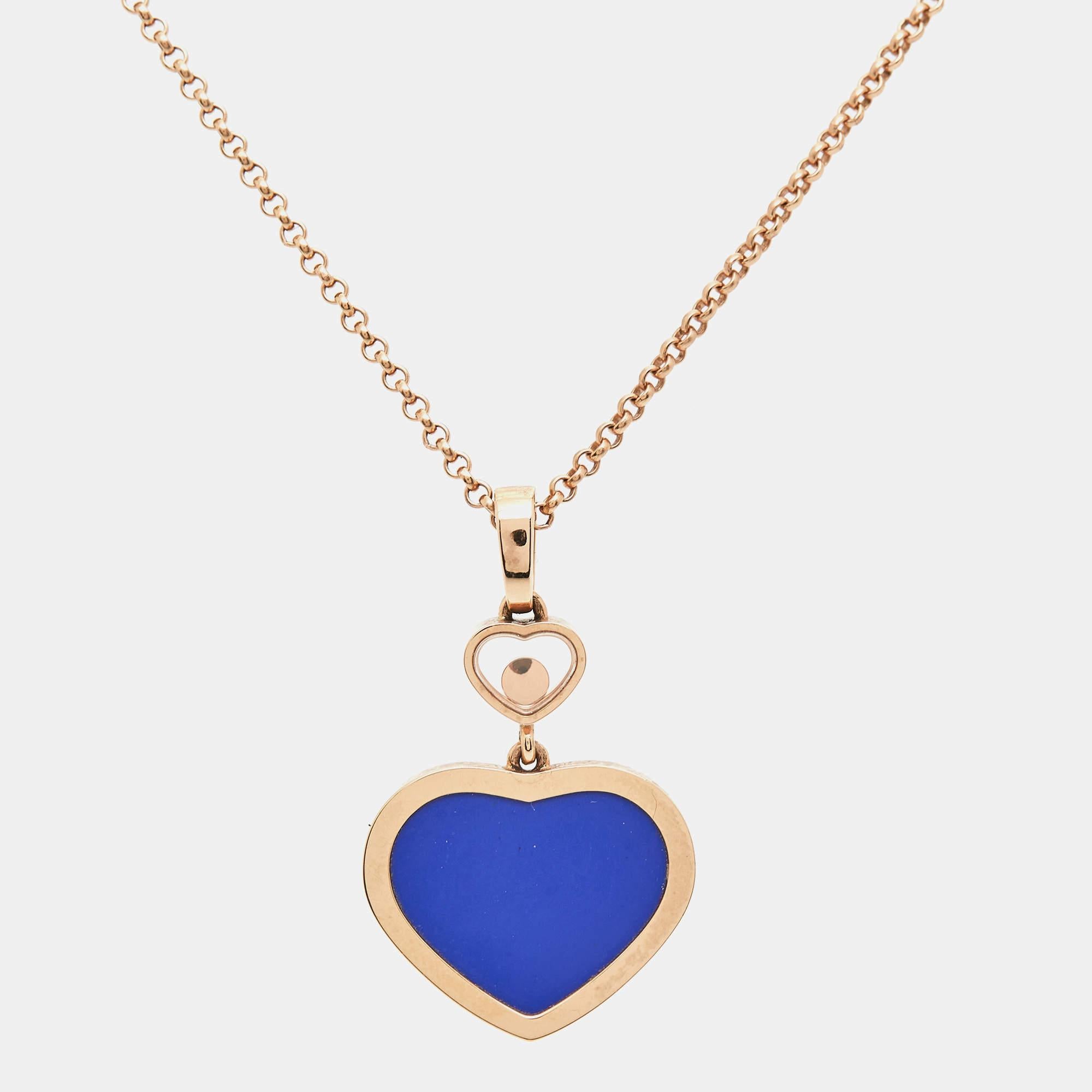 One look at this wondrous necklace from Chopard and our hearts flutter. It is from their Happy Hearts collection and has been created from 18k rose gold to shine. The chain holds two hearts - the larger one is inlaid with a blue stone and the