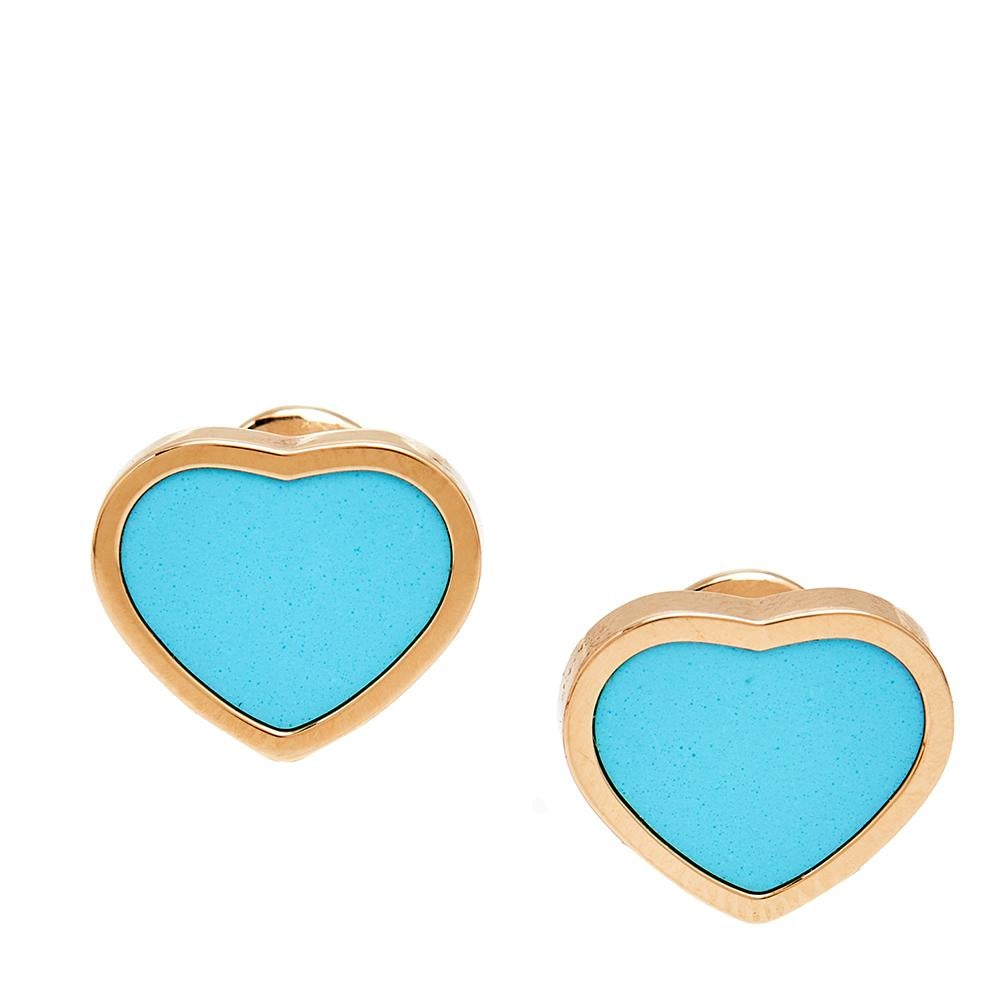 When it comes to timeless elegance and creativity, no one does it quite like Chopard. These gorgeous earrings from the celebrated Happy Hearts collection feature a heart motif inlaid in turquoise. Rendered in 18K rose gold, these alluring earrings