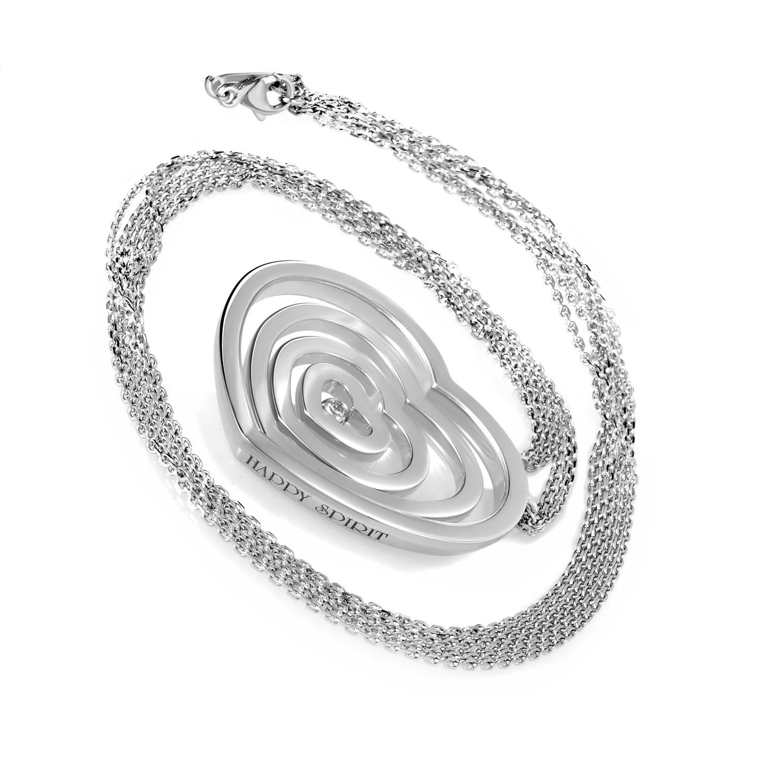 The Happy Spirit series continues to soar with this pendant necklace from Chopard. A heart motif of 18K White Gold is shaped and repeated, its contracting ripple pucnctuated by the 0.10ct diamond at its center. A hypnotic celebration of sweet